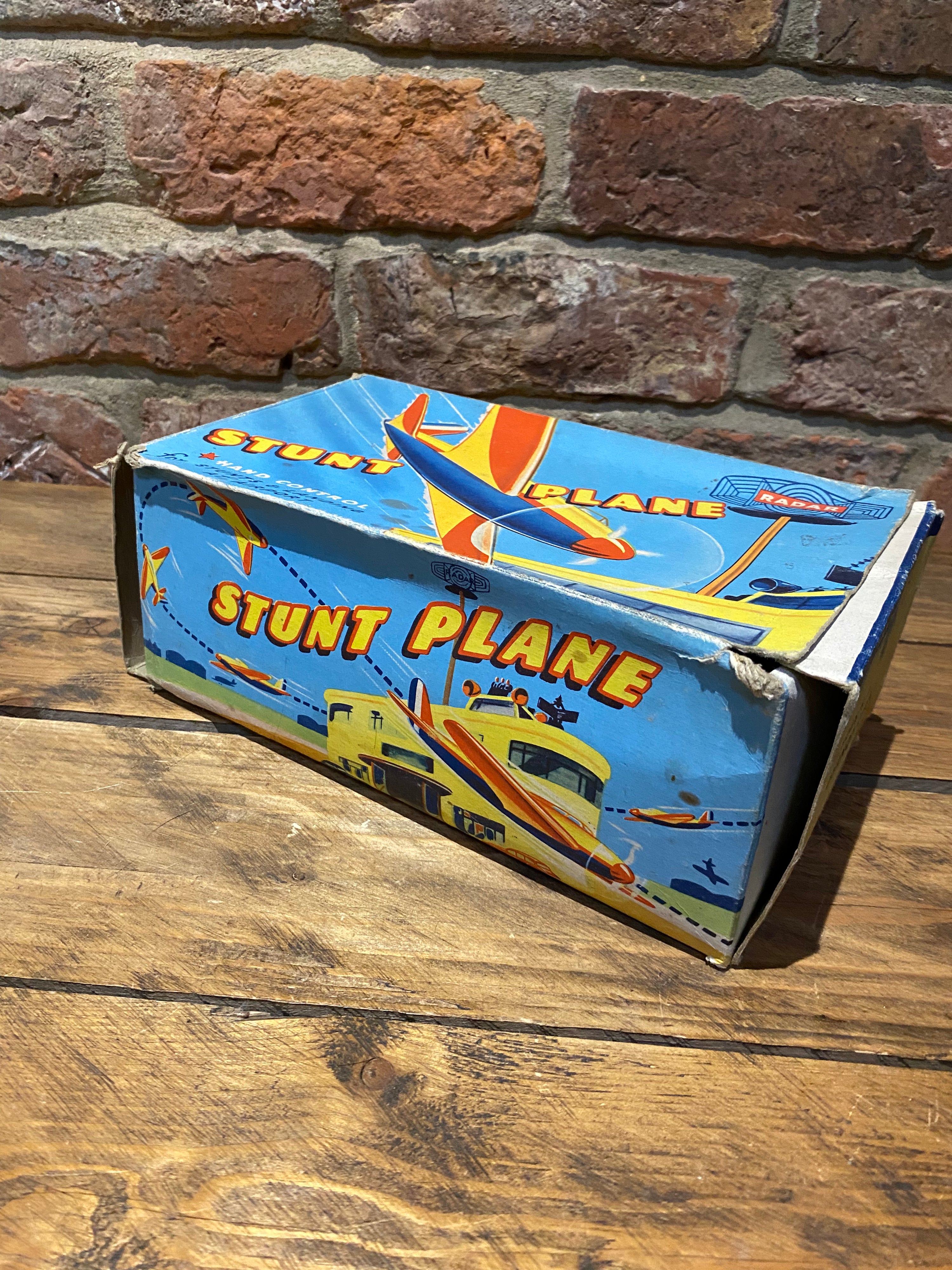 Radar Toys Wind-Up Tin-Plate Stunt Plane