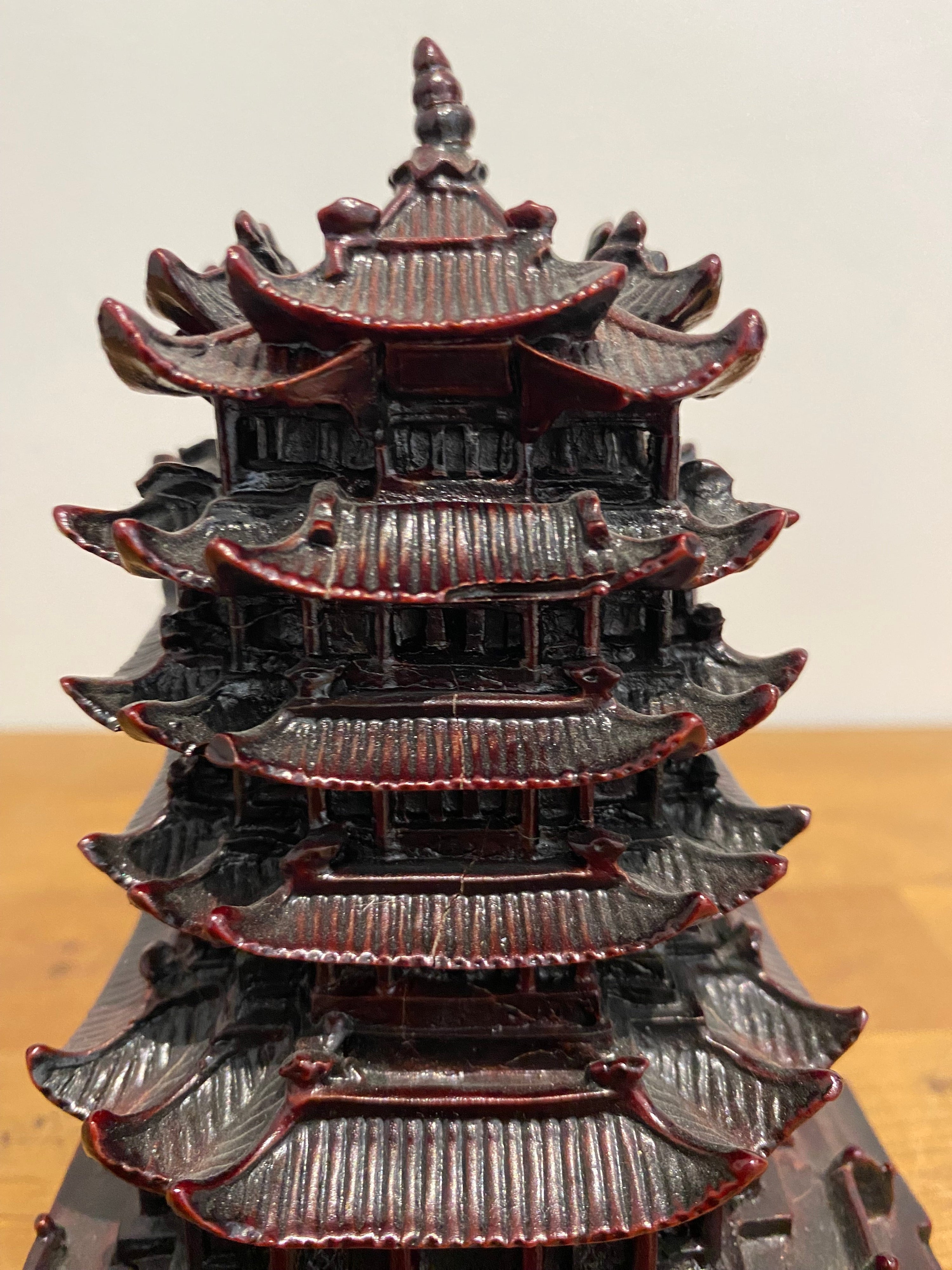 Small Resin Chinese Temple Ornament, Ox Blood Colour .