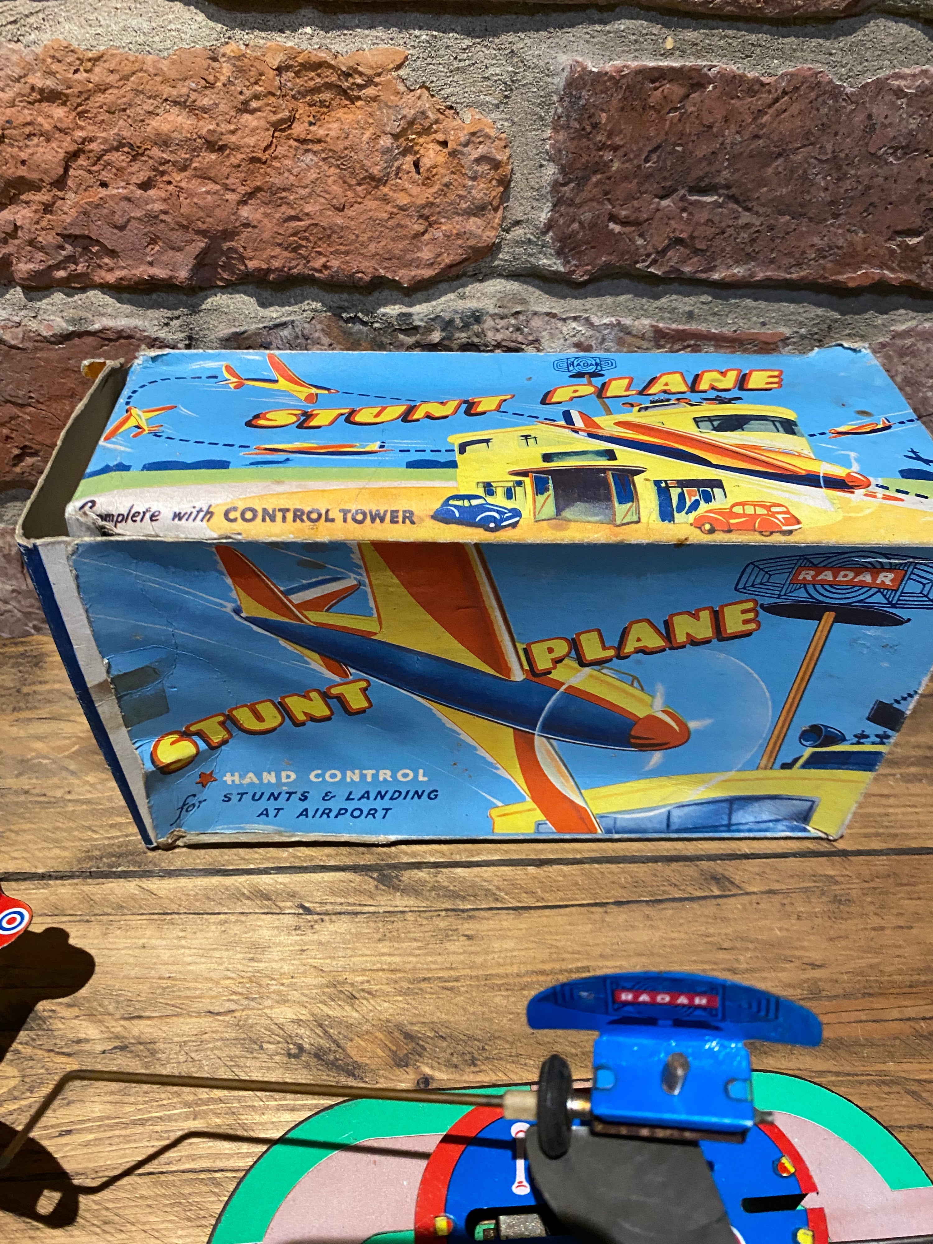 Radar Toys Wind-Up Tin-Plate Stunt Plane