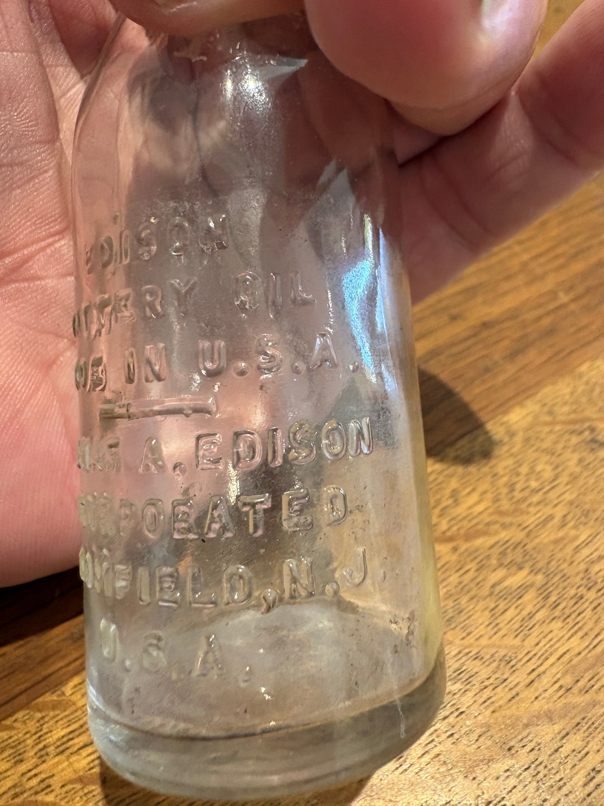 Vintage Edison Battery Oil Glass Bottle , Made In USA. 4 Inches High