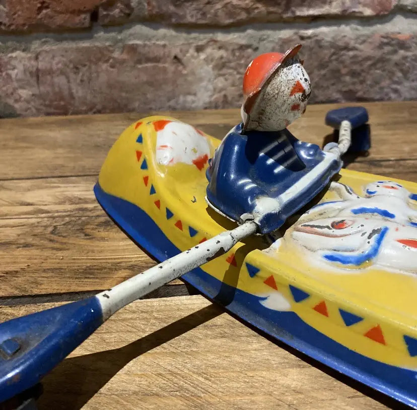 Rare Push Along Mobo Tinplate Canoe