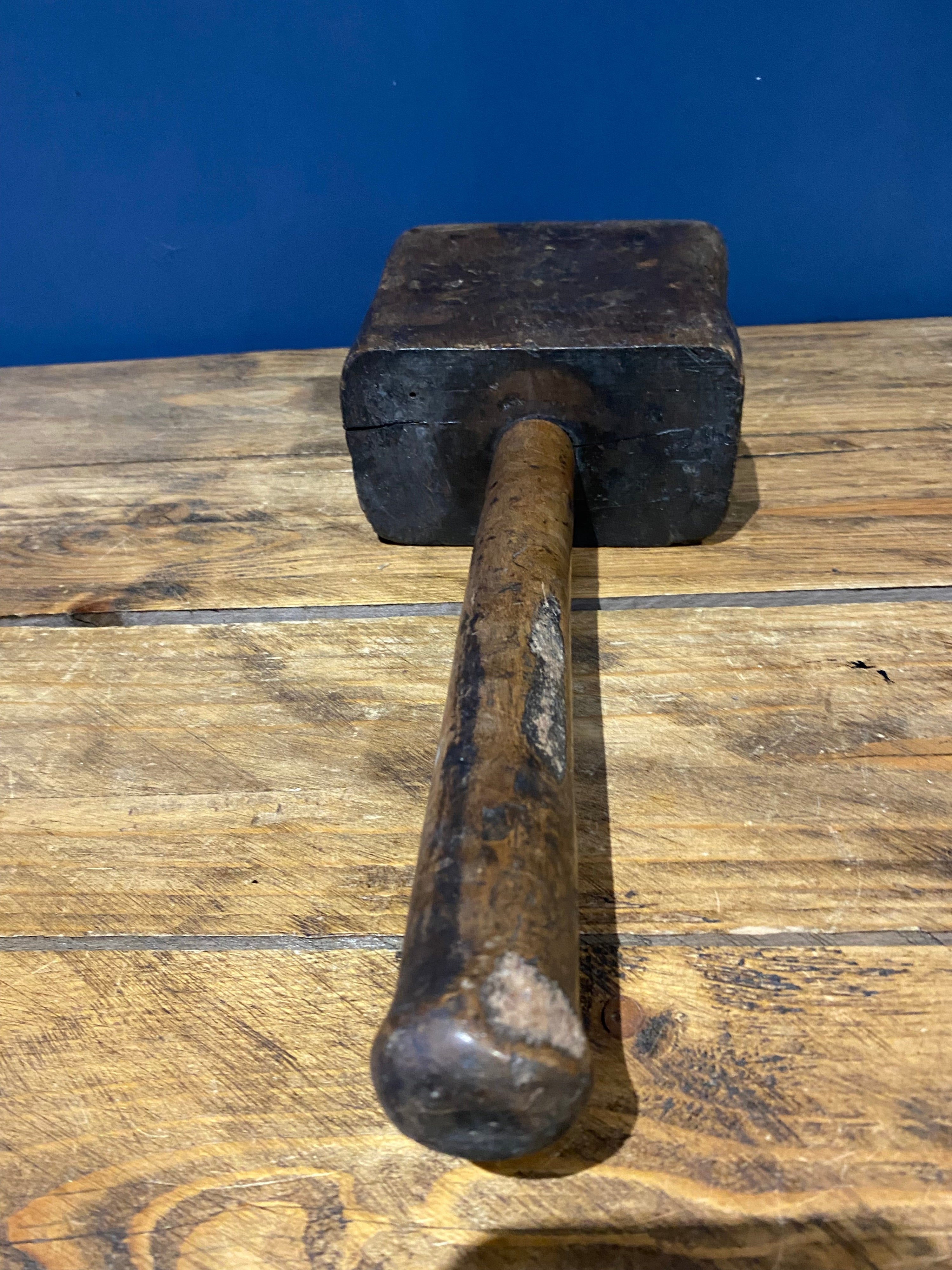 Large decorative well worn wooden mallet