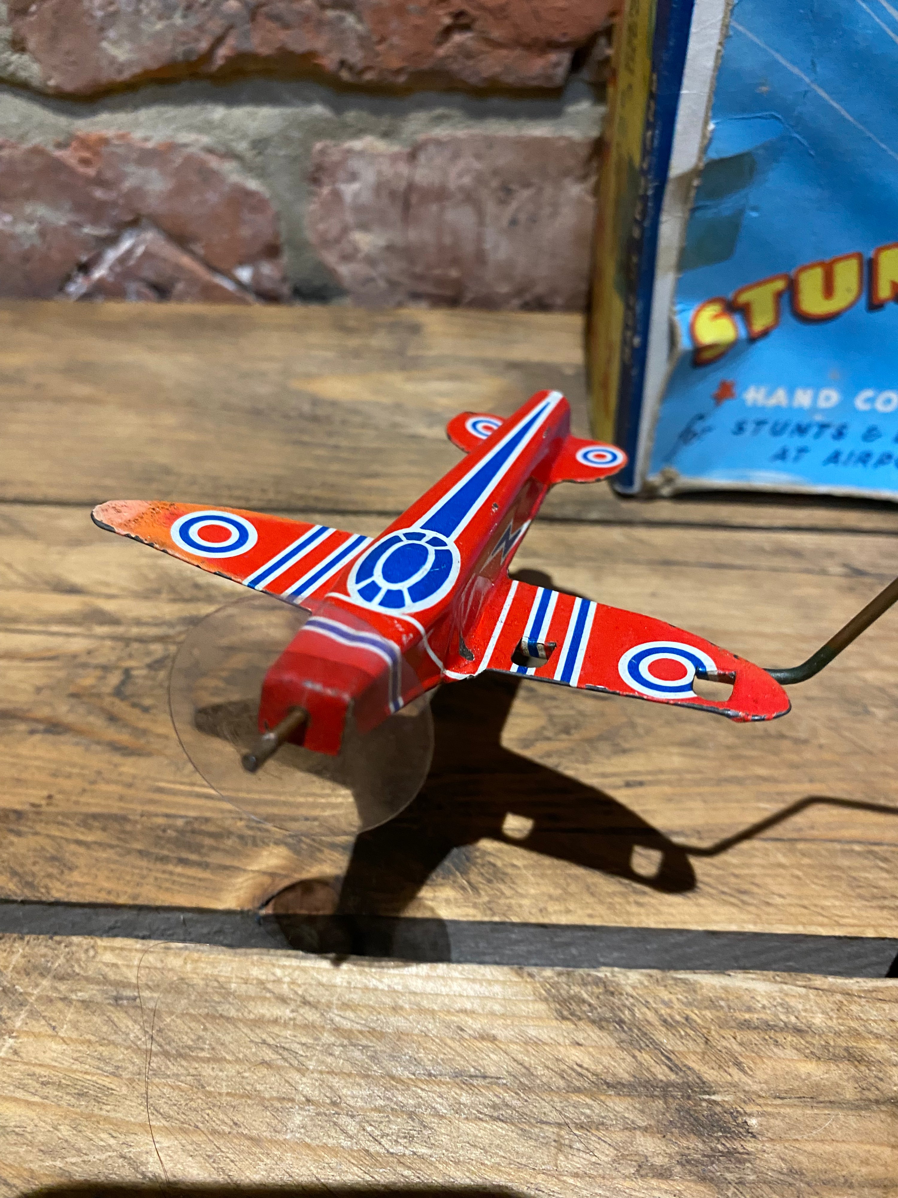Radar Toys Wind-Up Tin-Plate Stunt Plane