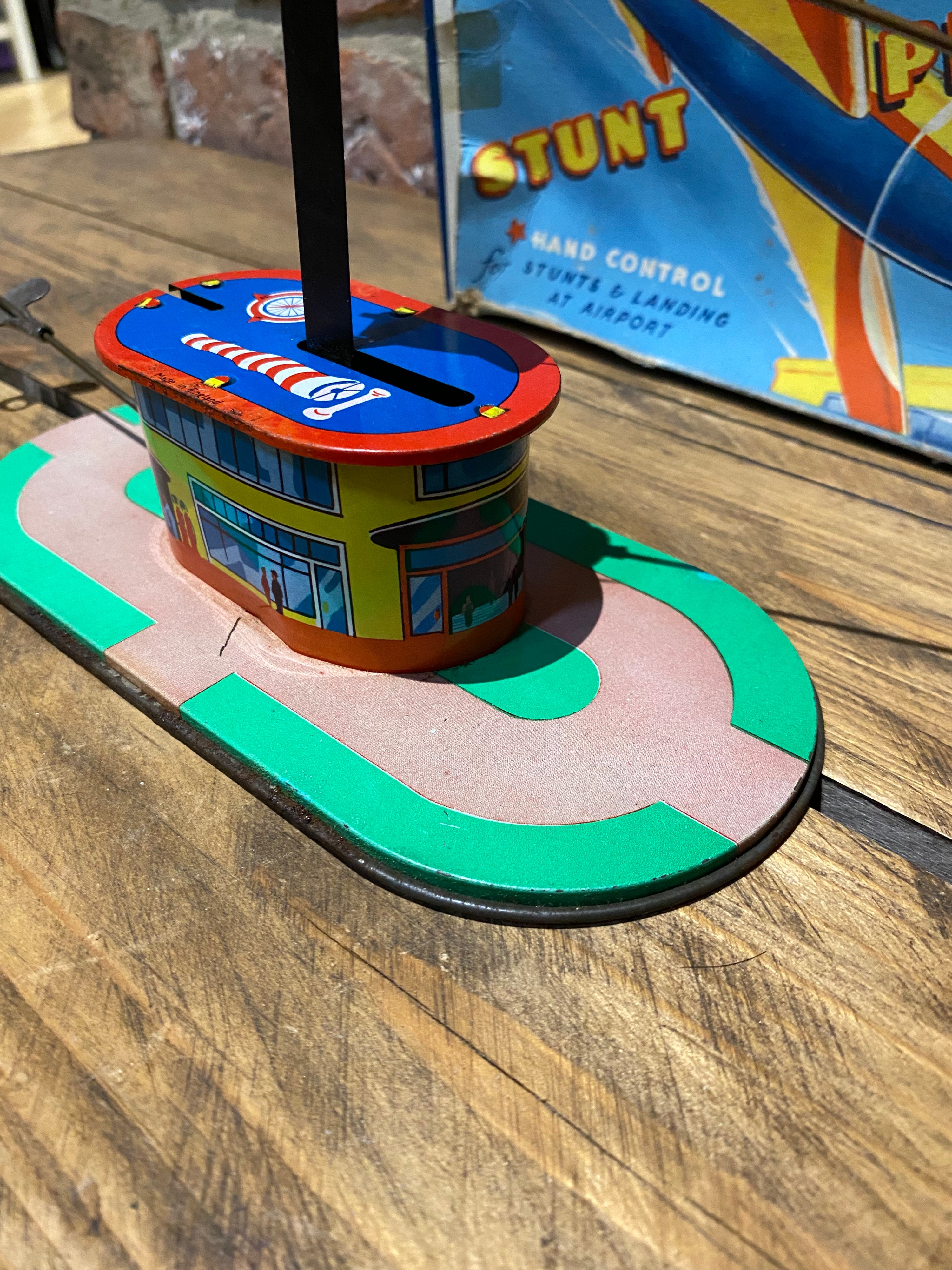 Radar Toys Wind-Up Tin-Plate Stunt Plane