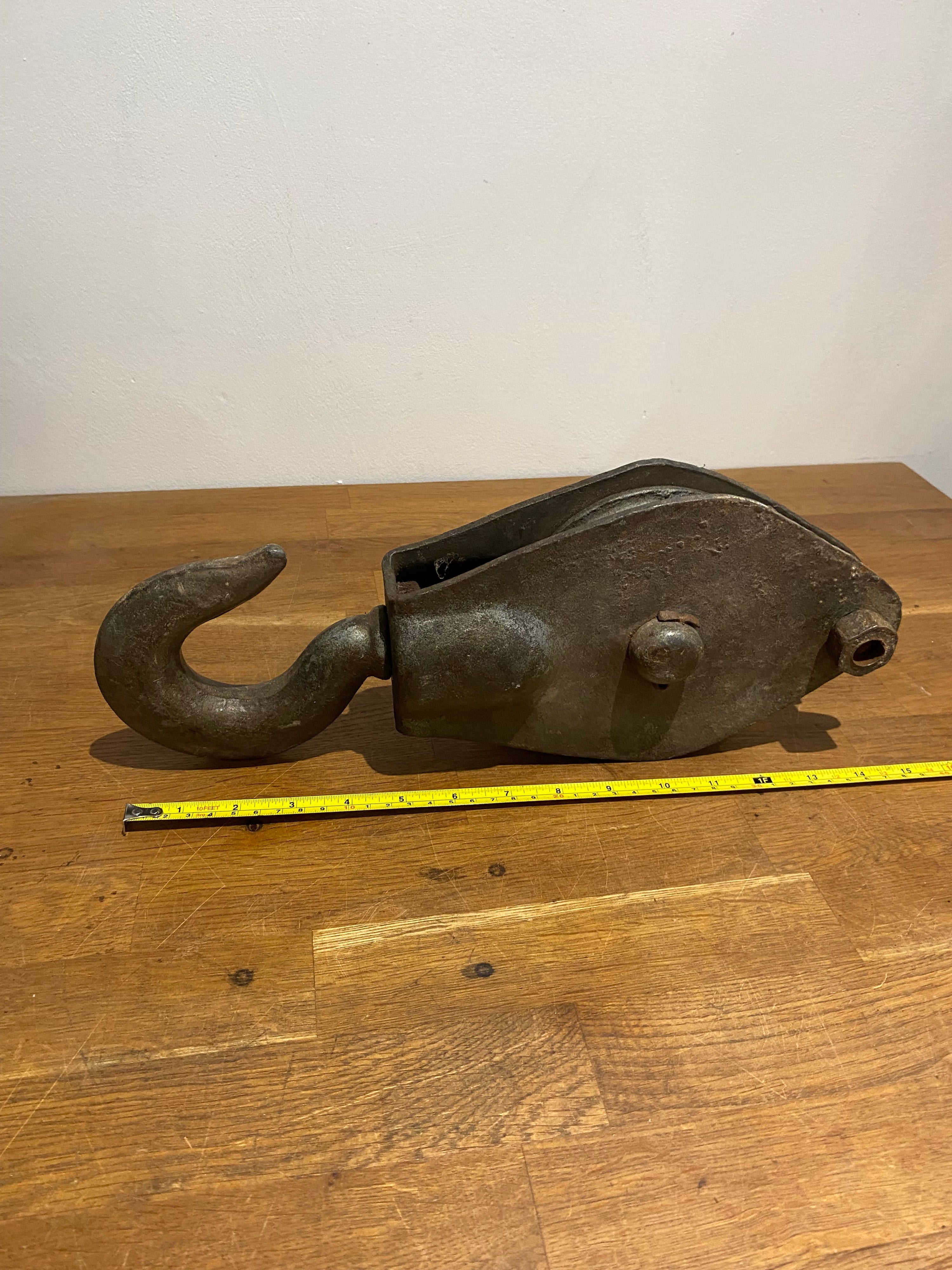Large heavy industrial block and tackle, pulley wheel