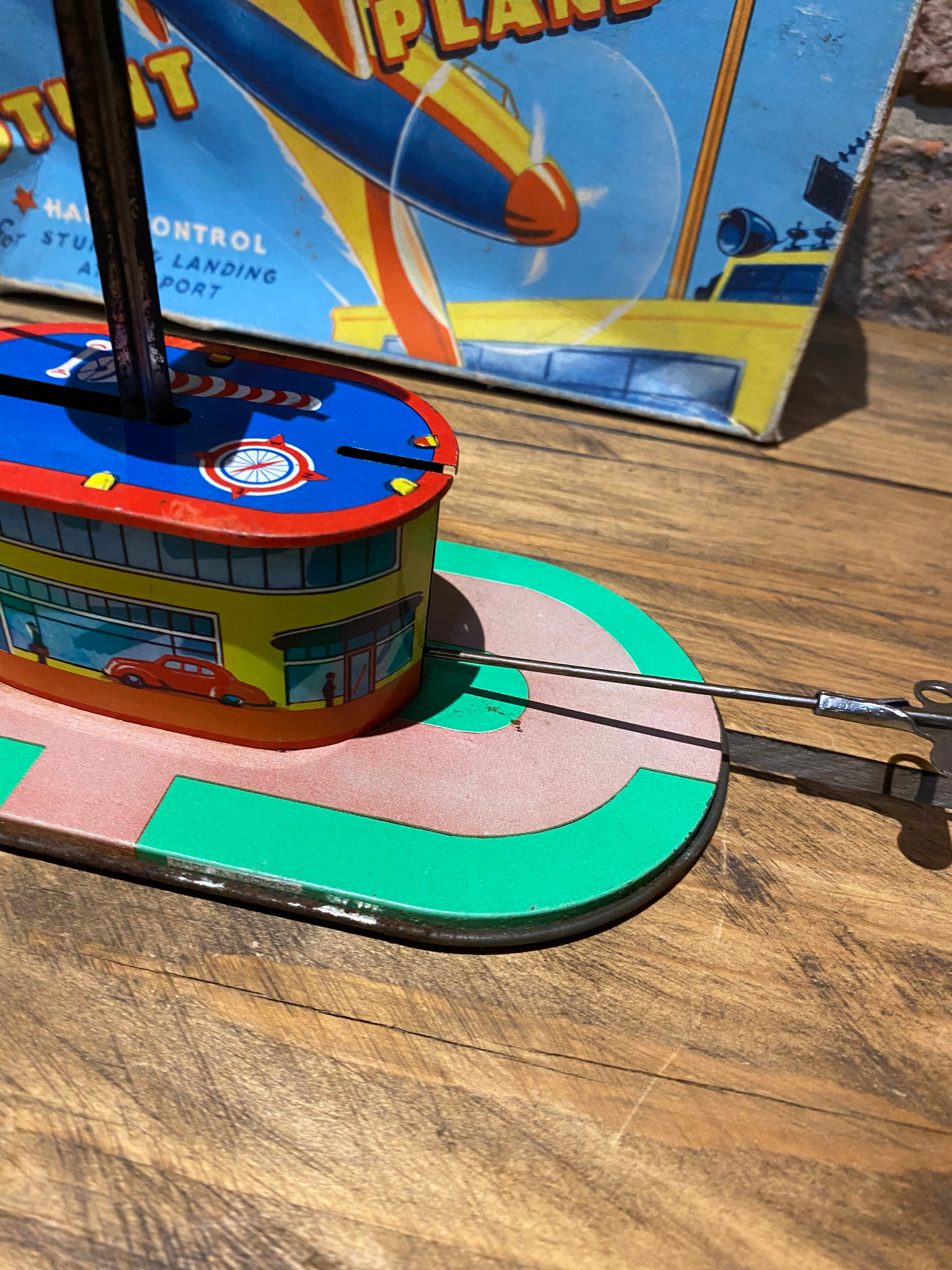 Radar Toys Wind-Up Tin-Plate Stunt Plane