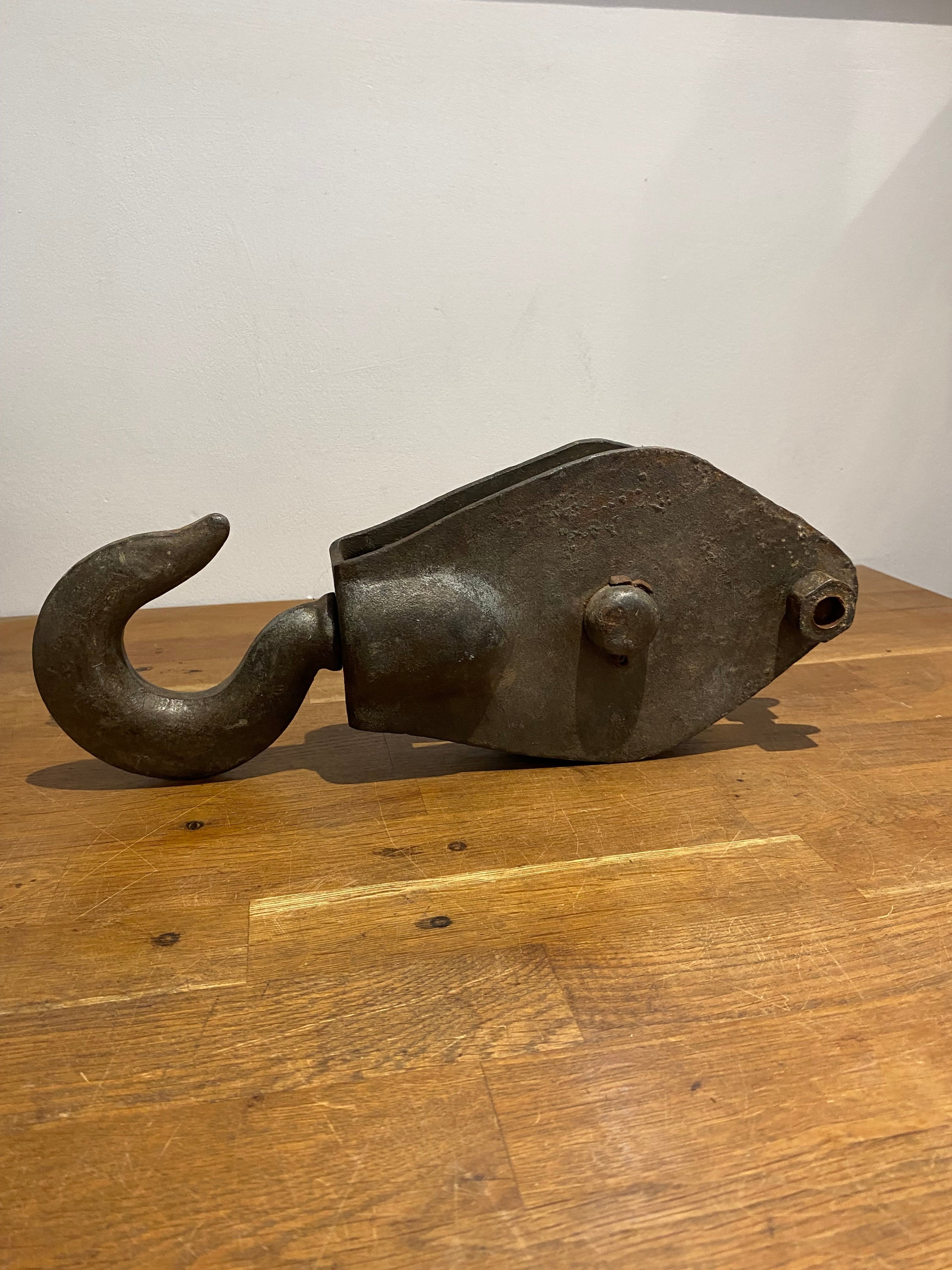 Large heavy industrial block and tackle, pulley wheel