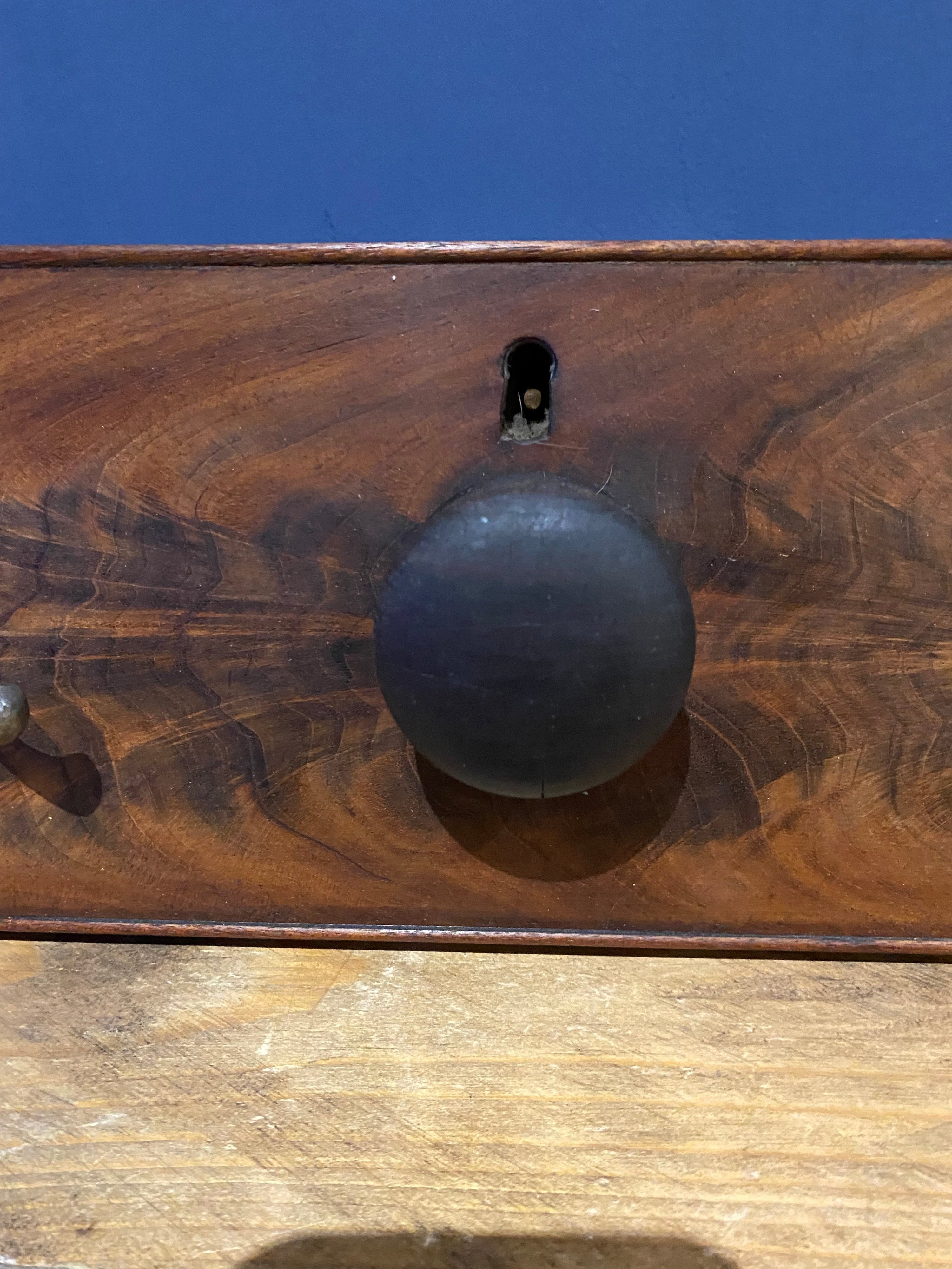 Handmade drawer front coat hanger