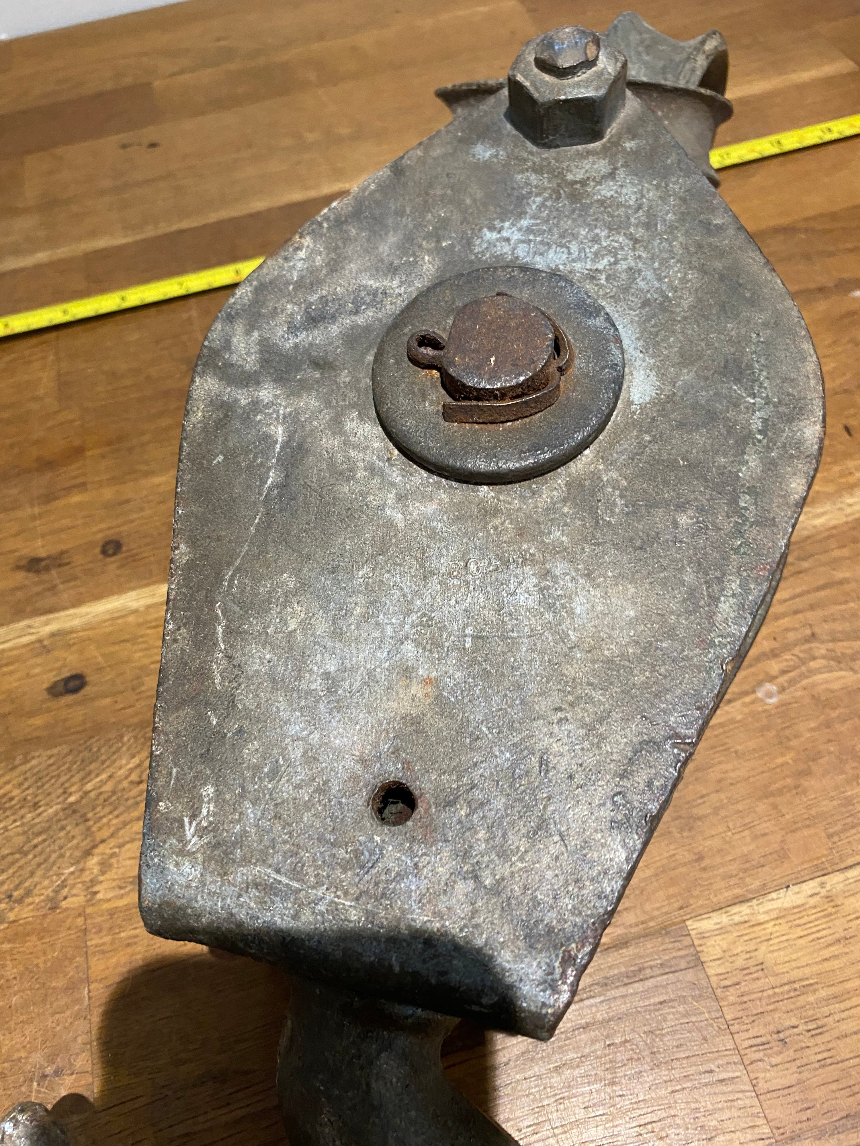 Very large industrial cast block and tackle, double pulley.