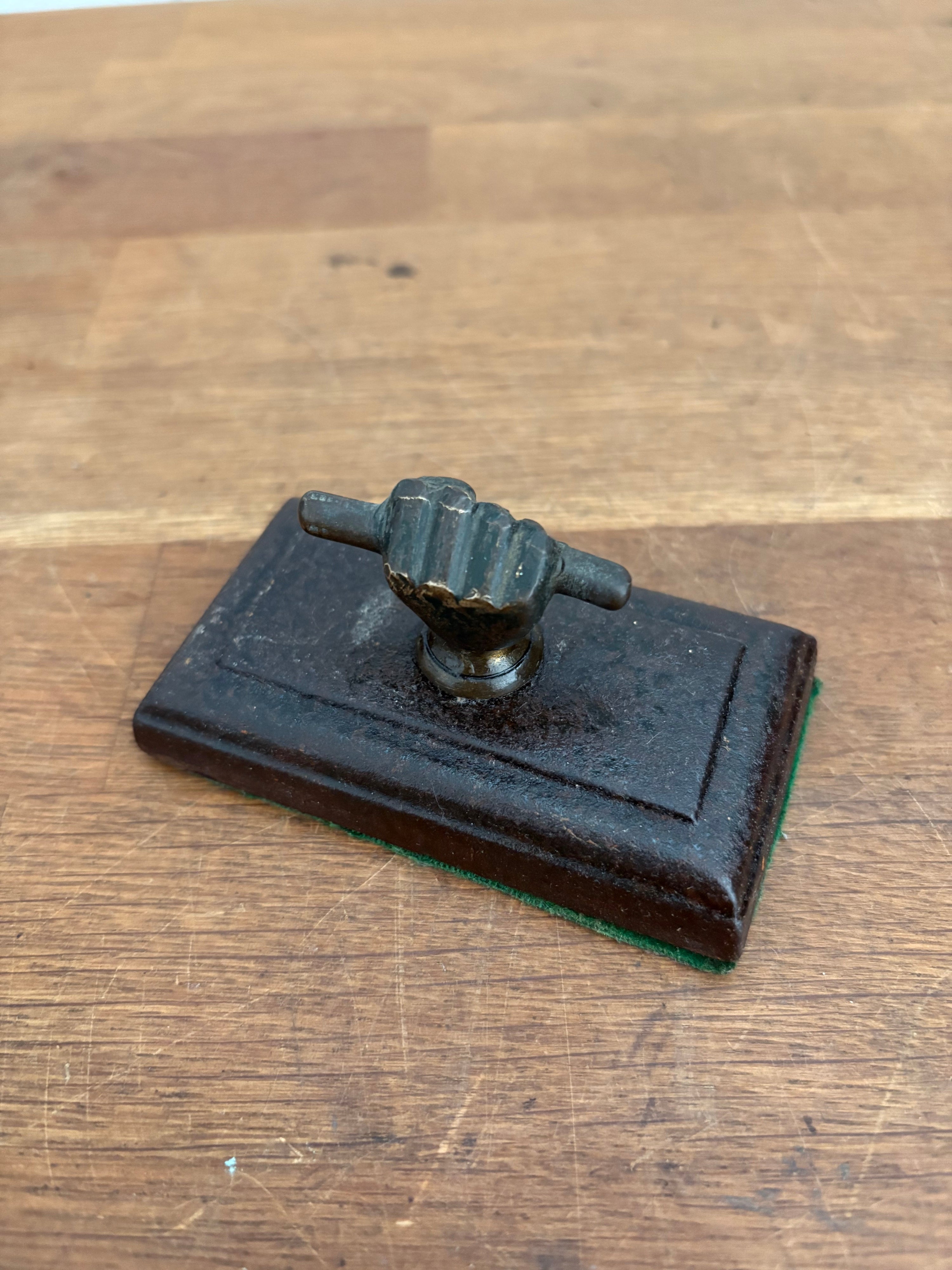 Antique Cast Iron Paperweight, Fist And Scroll/ Hand And Scroll . Brass Hand
