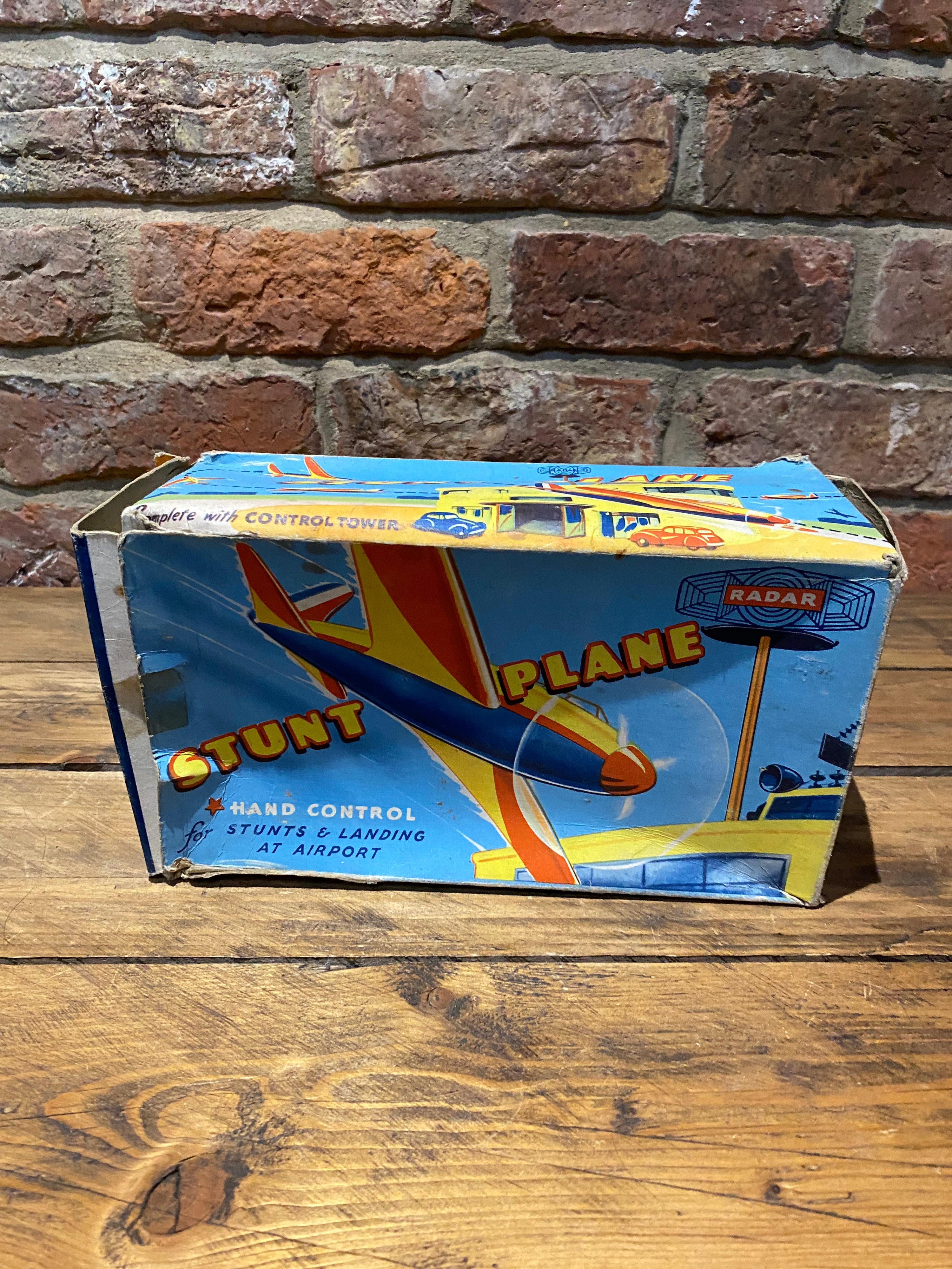 Radar Toys Wind-Up Tin-Plate Stunt Plane