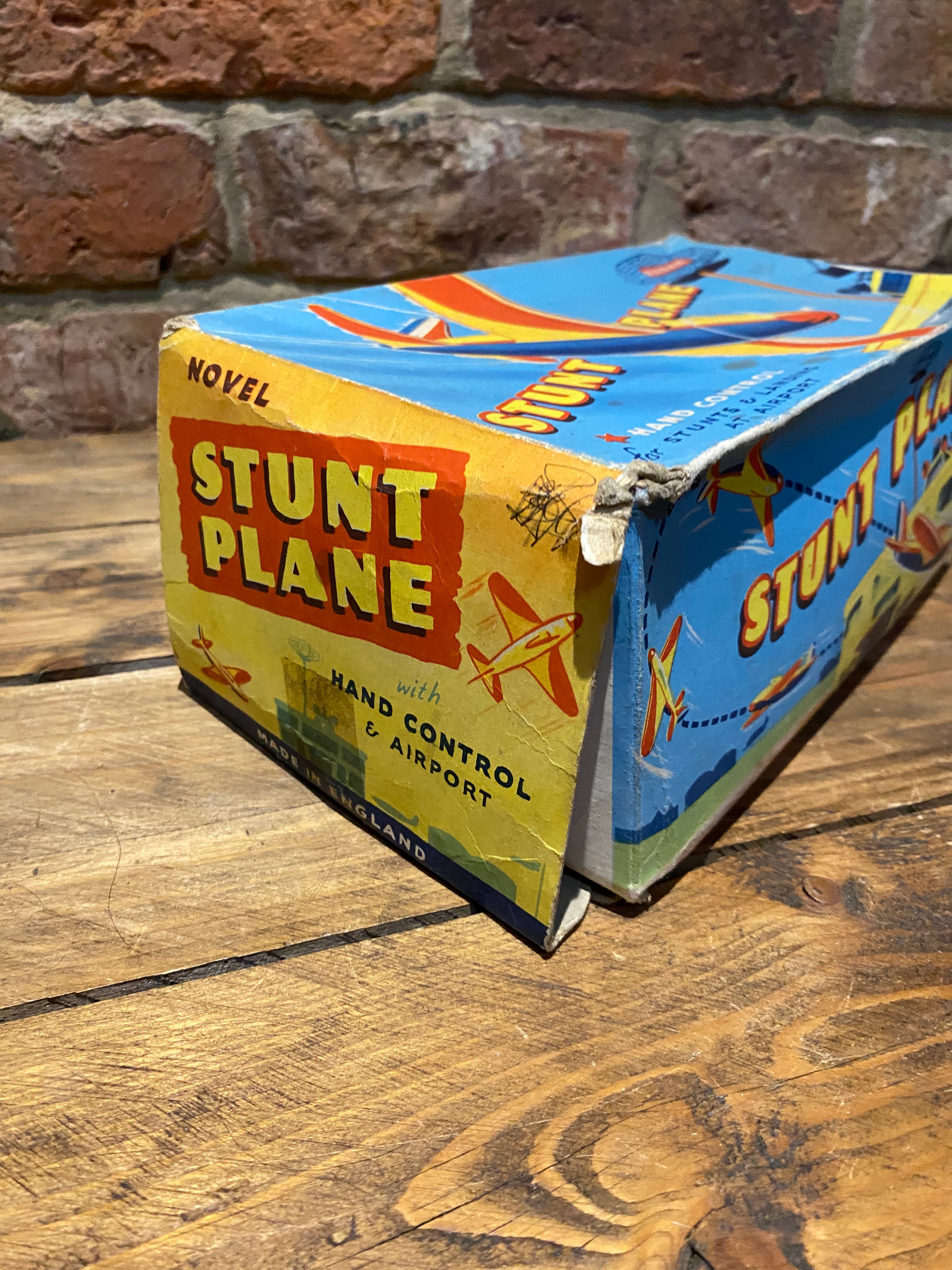 Radar Toys Wind-Up Tin-Plate Stunt Plane