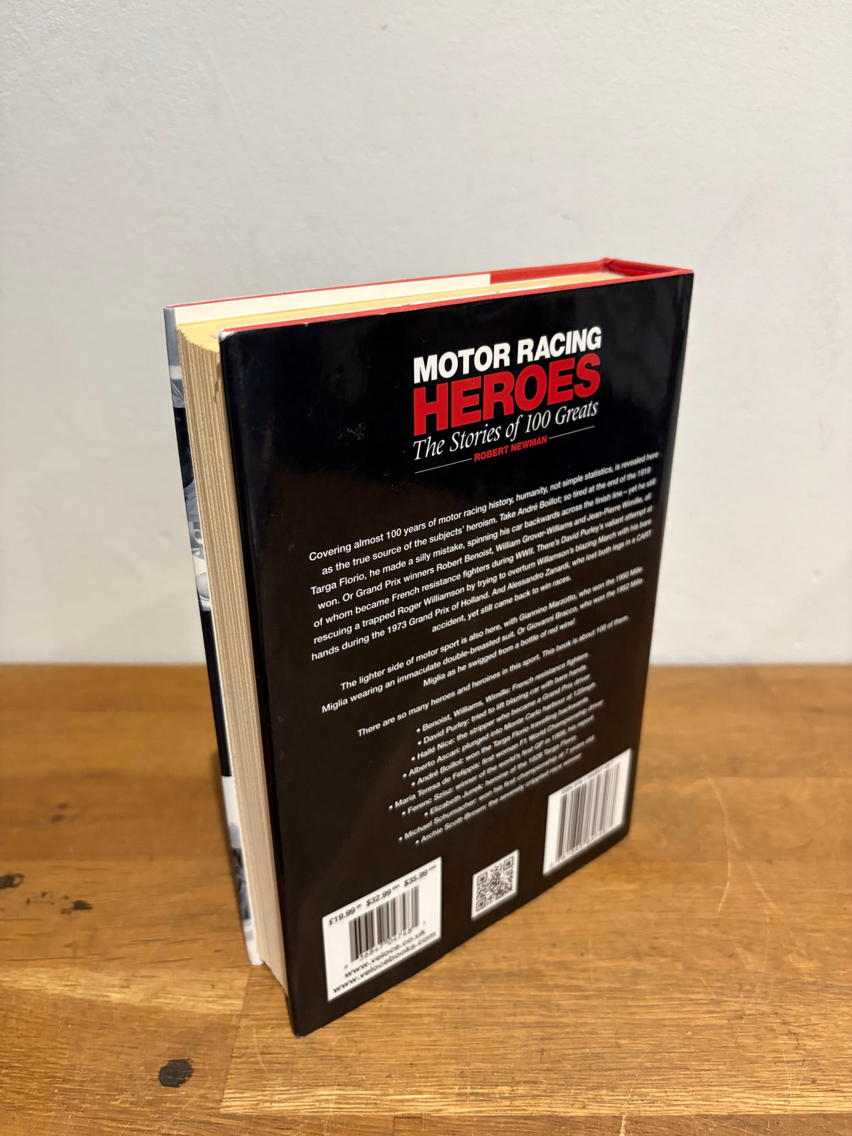 Motor racing heroes, the stories of 100 greats , Robert Newman , hardback