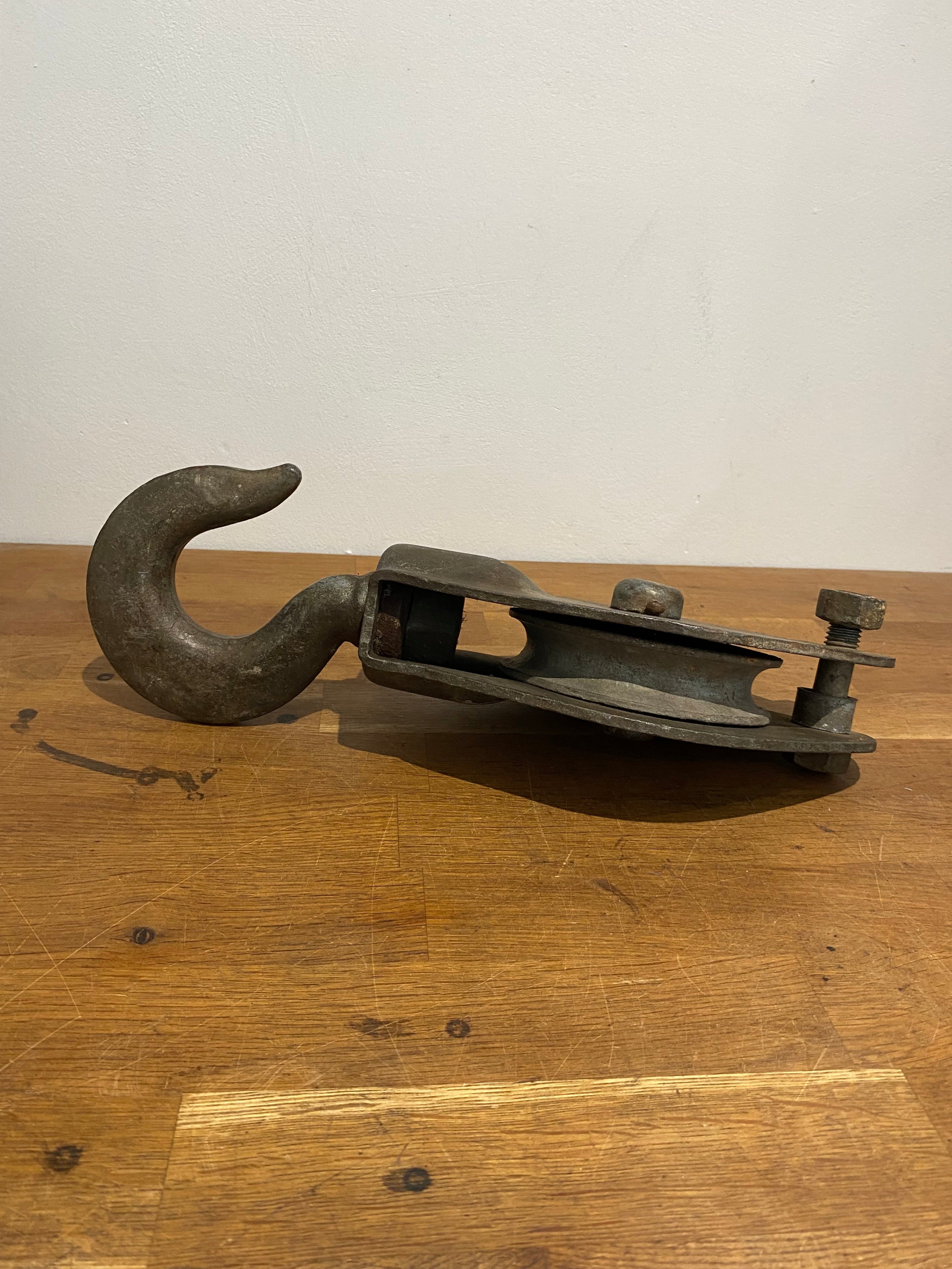 Large heavy industrial block and tackle, pulley wheel