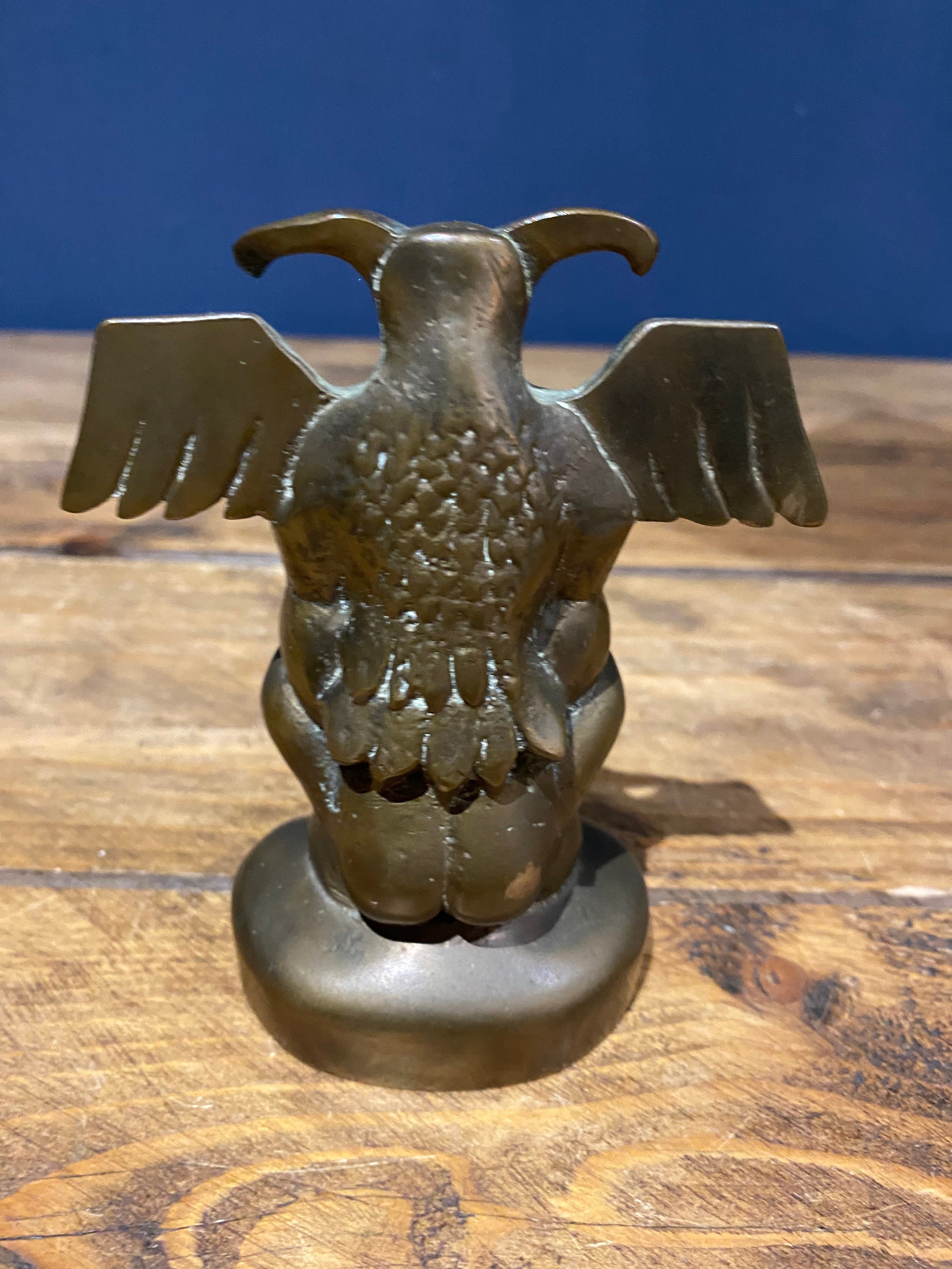 Heavy brass totem ornament