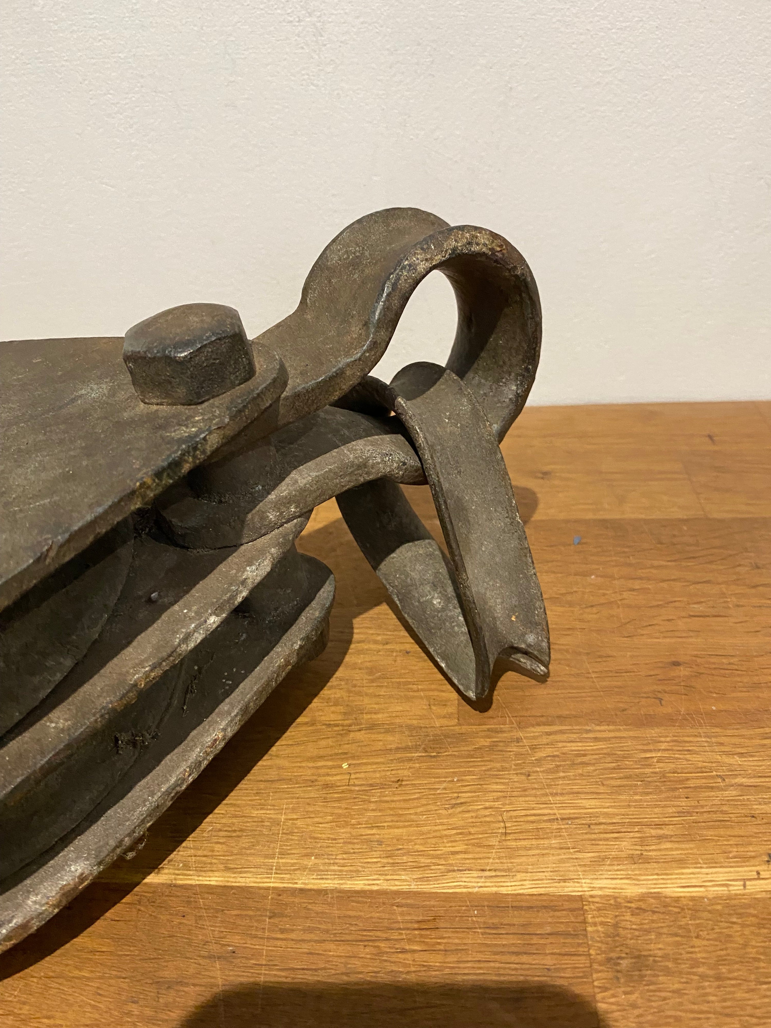 Very large industrial cast block and tackle, double pulley.