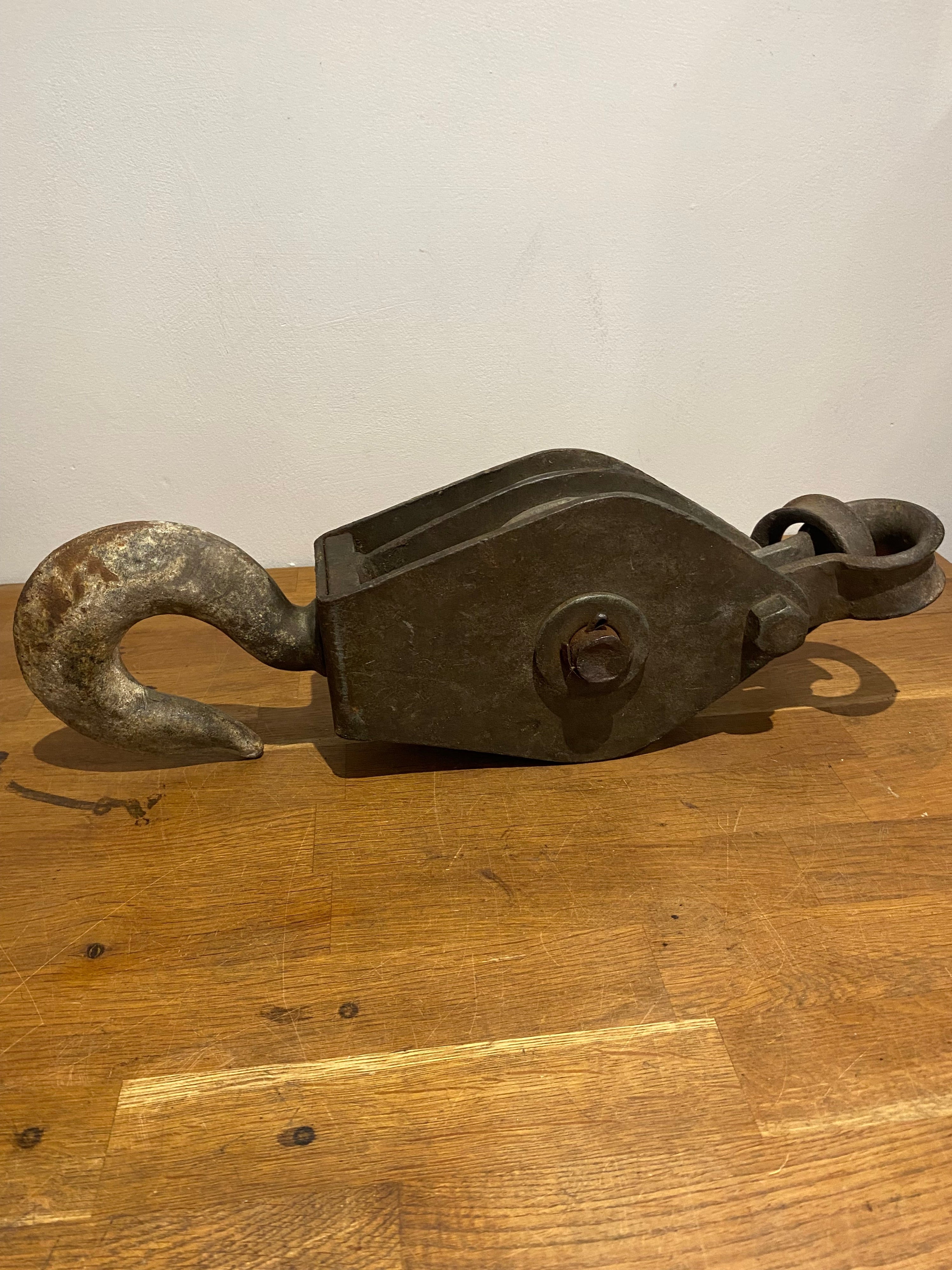 Very large industrial cast block and tackle, double pulley.