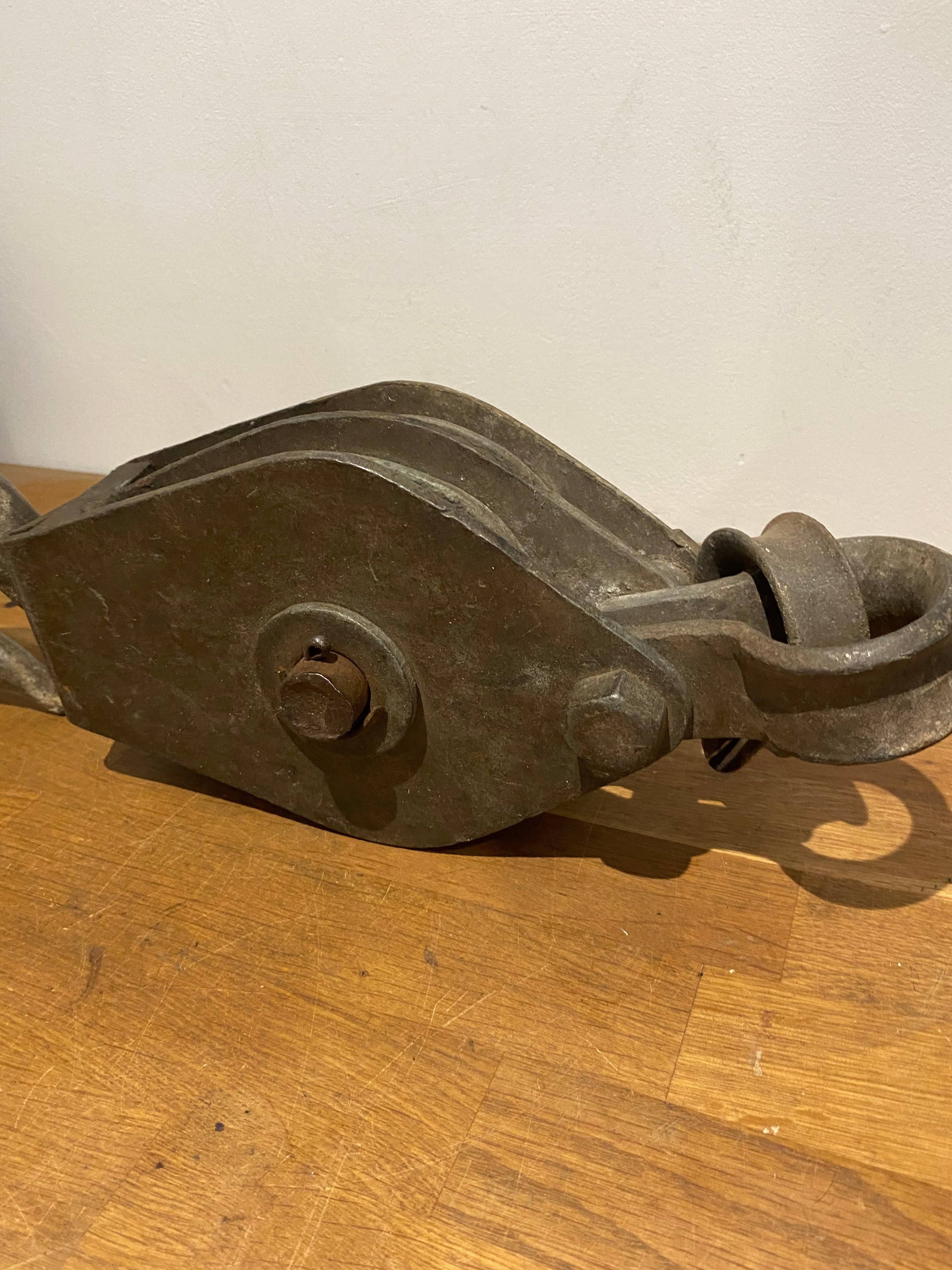 Very large industrial cast block and tackle, double pulley.