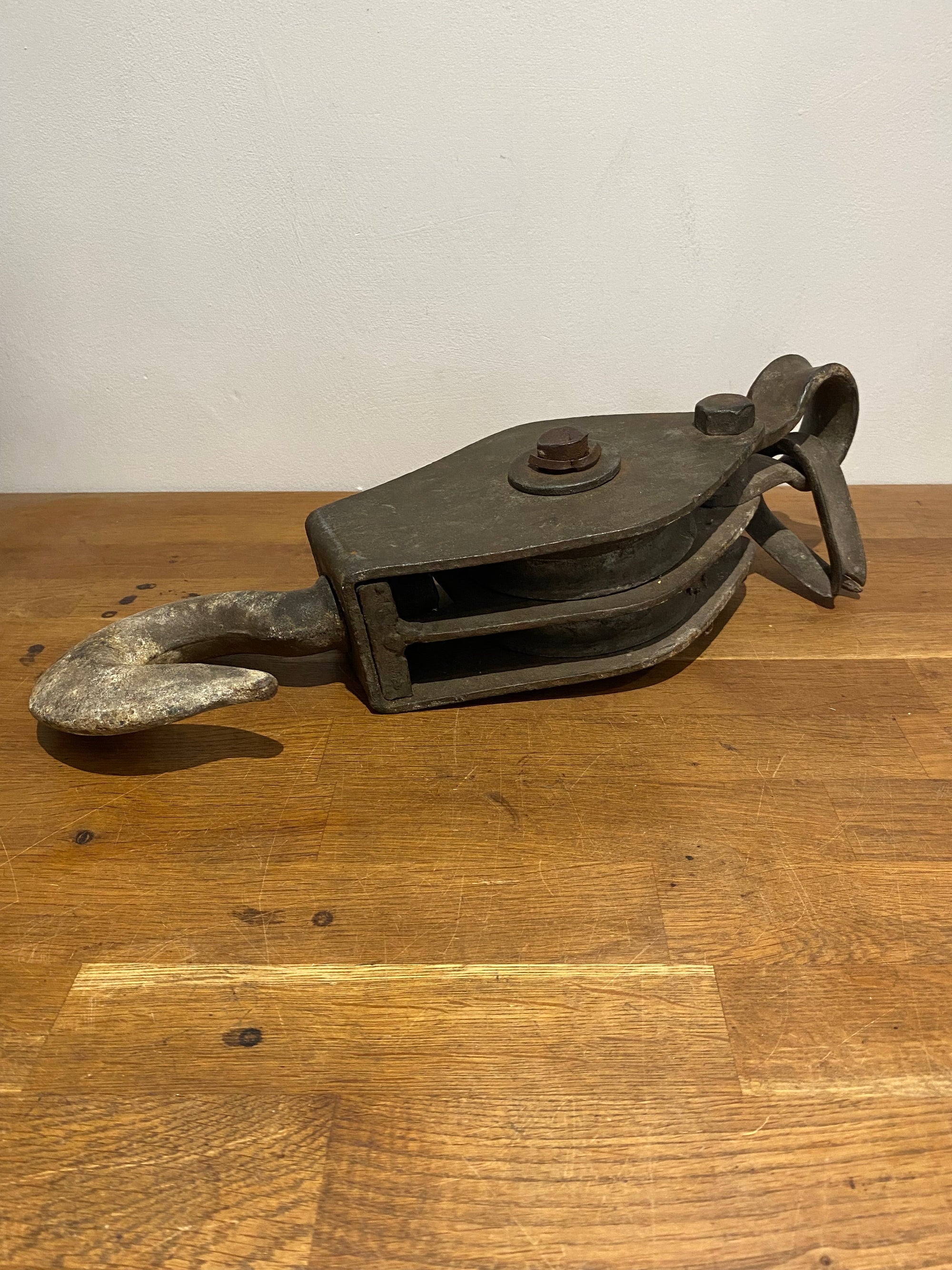 Very large industrial cast block and tackle, double pulley.
