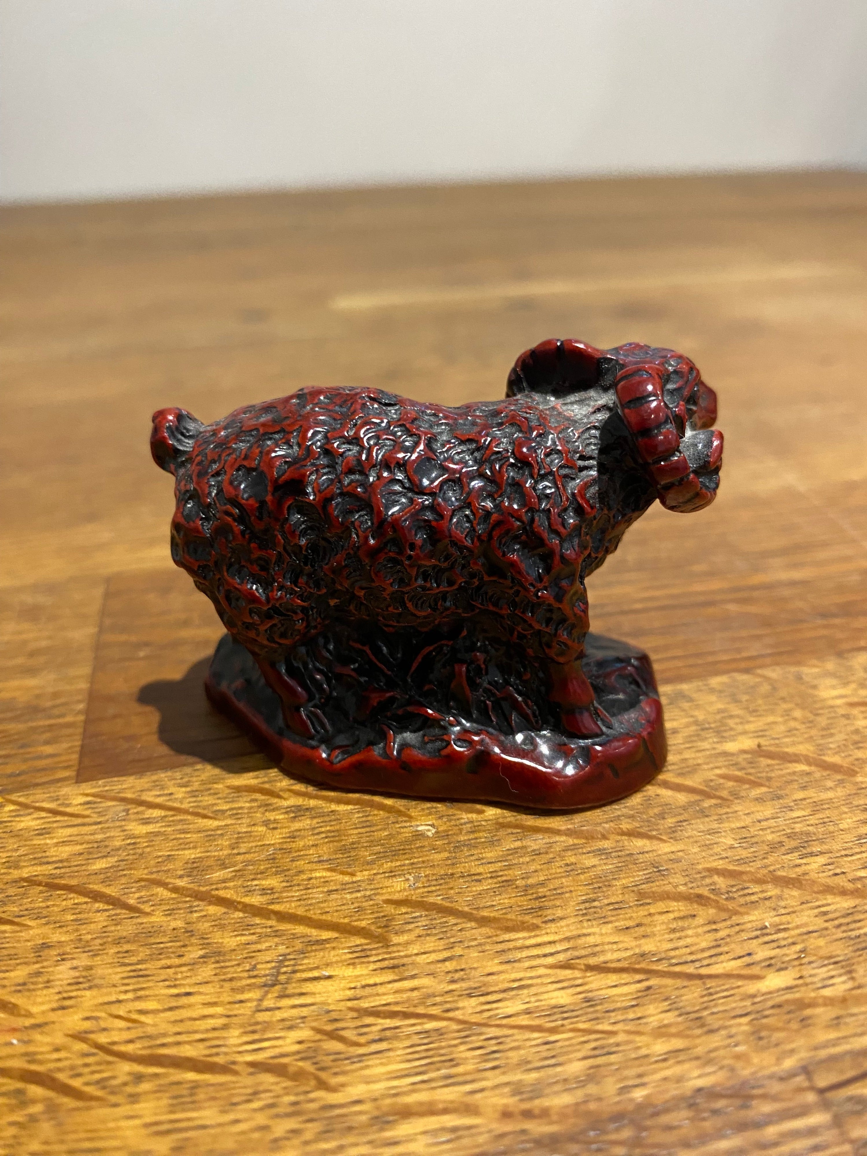 Miniature chinese year of the ram resin figure.