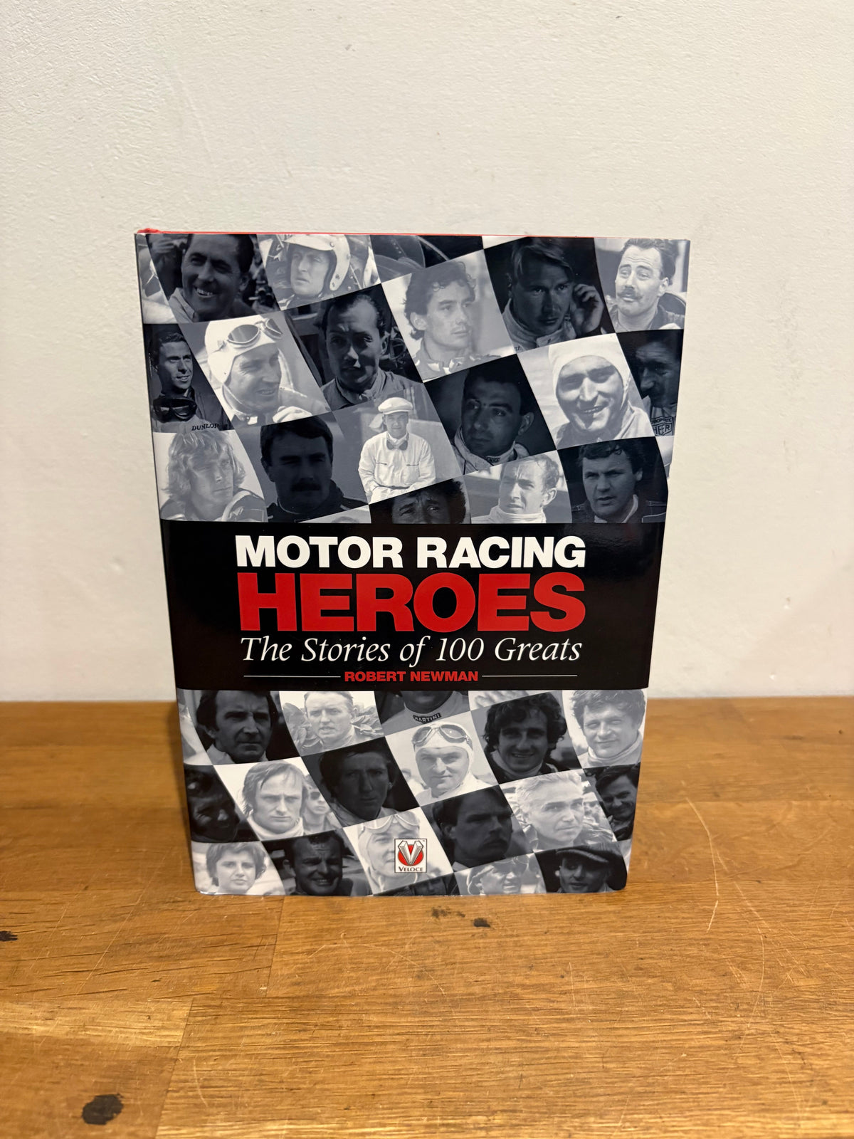 Motor racing heroes, the stories of 100 greats , Robert Newman , hardback