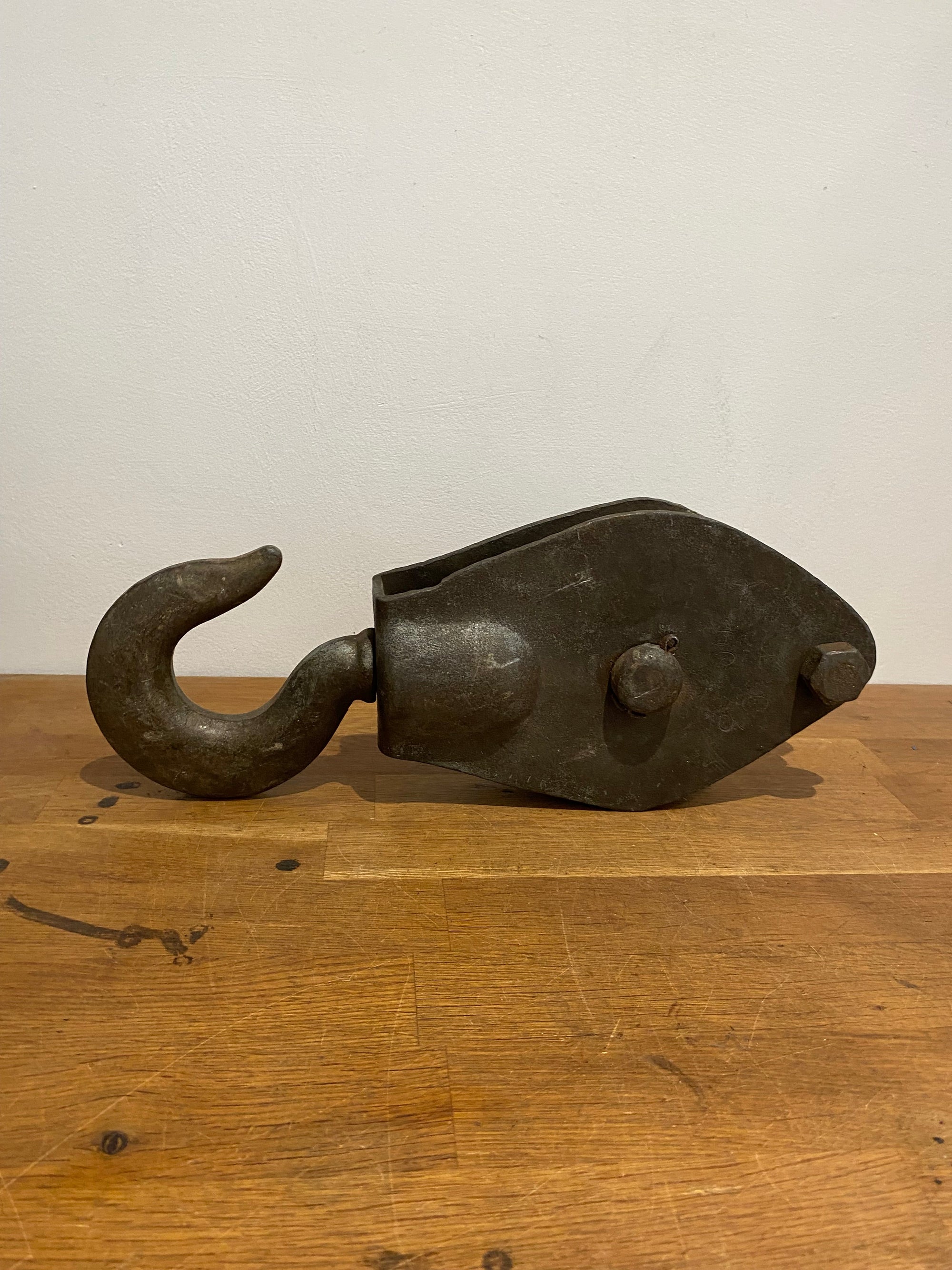 Large heavy industrial block and tackle, pulley wheel