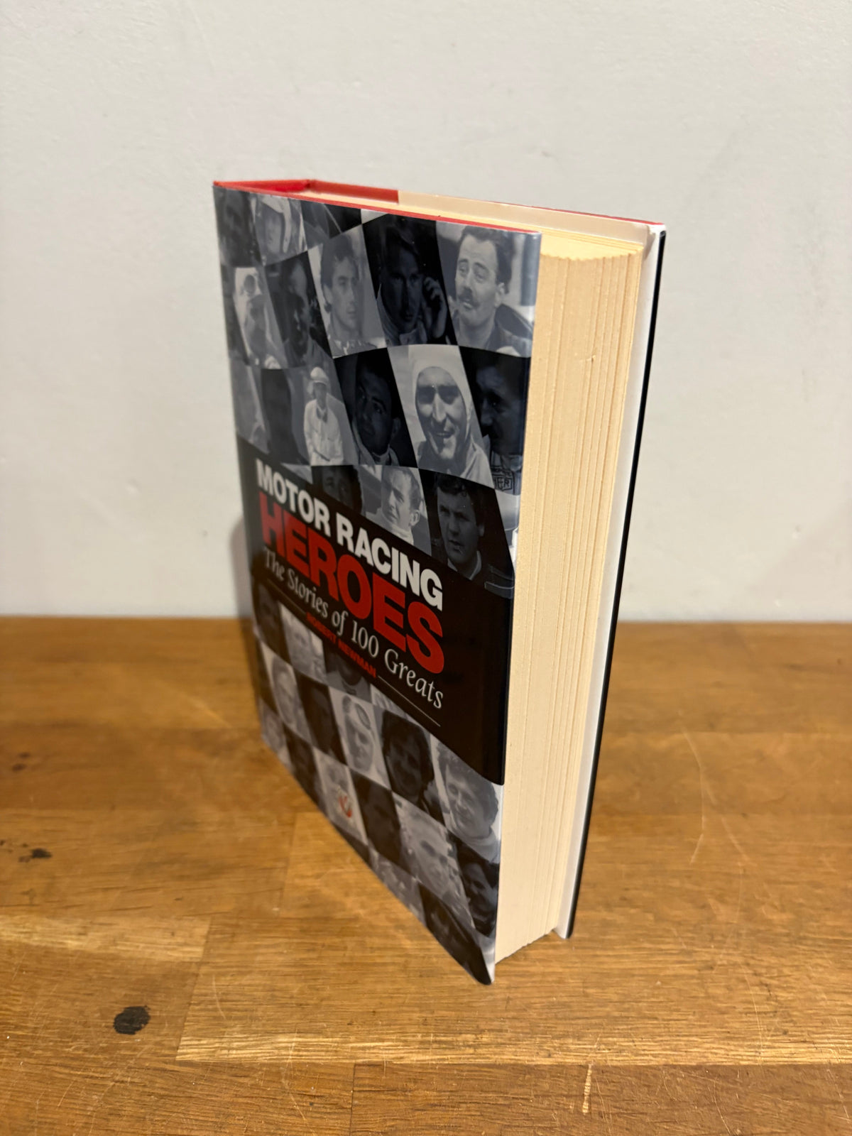 Motor racing heroes, the stories of 100 greats , Robert Newman , hardback