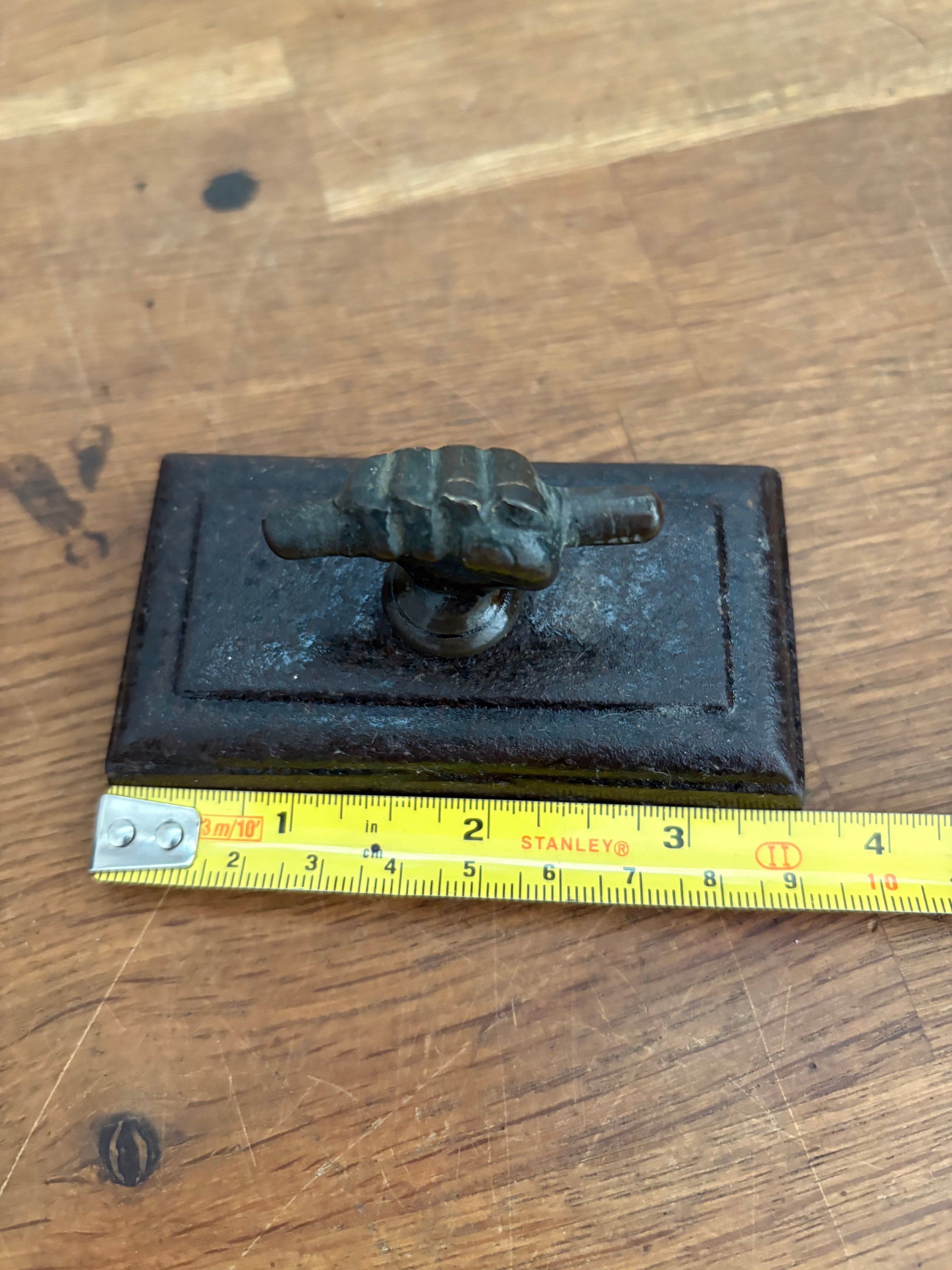 Antique Cast Iron Paperweight, Fist And Scroll/ Hand And Scroll . Brass Hand