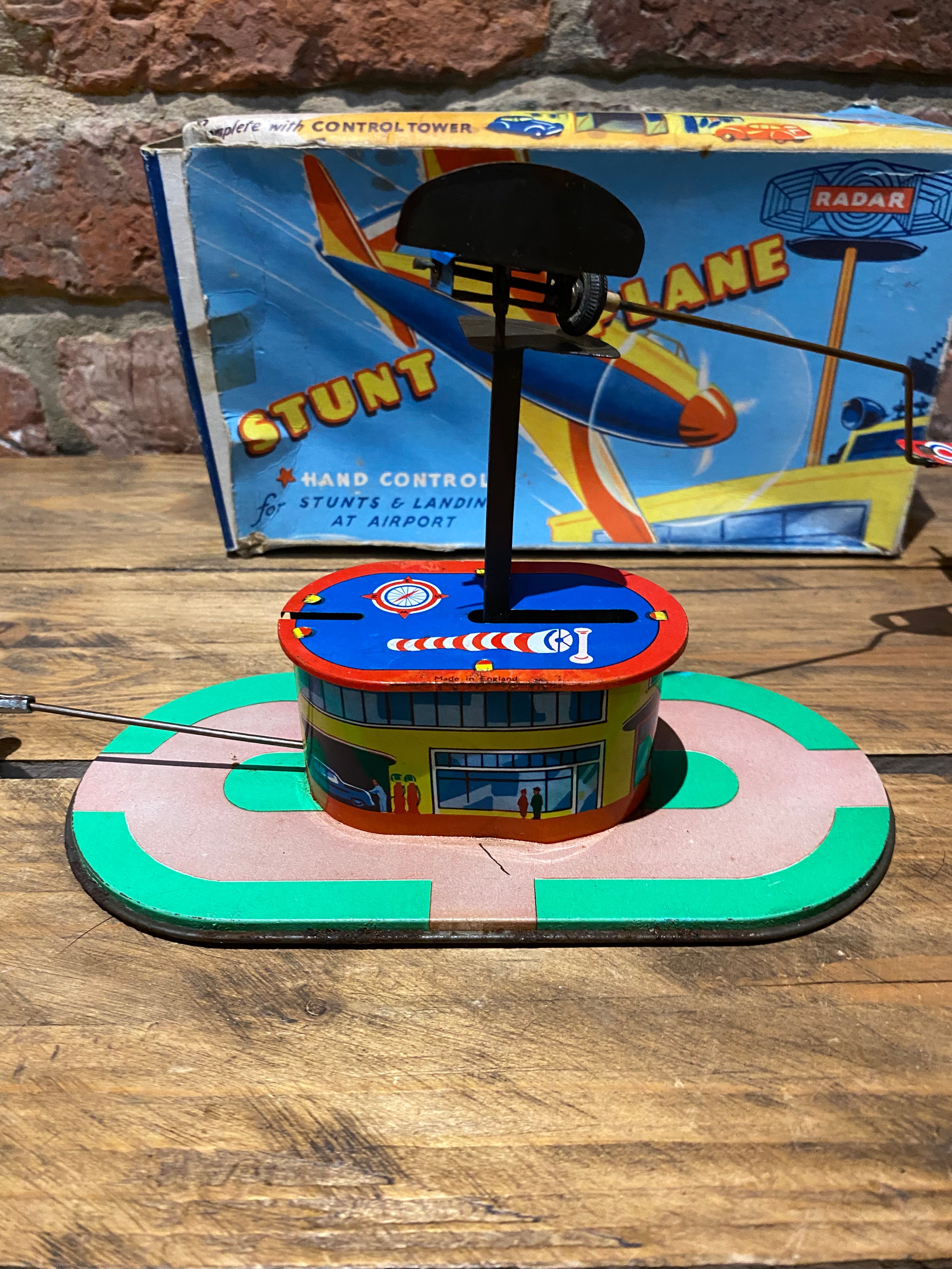 Radar Toys Wind-Up Tin-Plate Stunt Plane