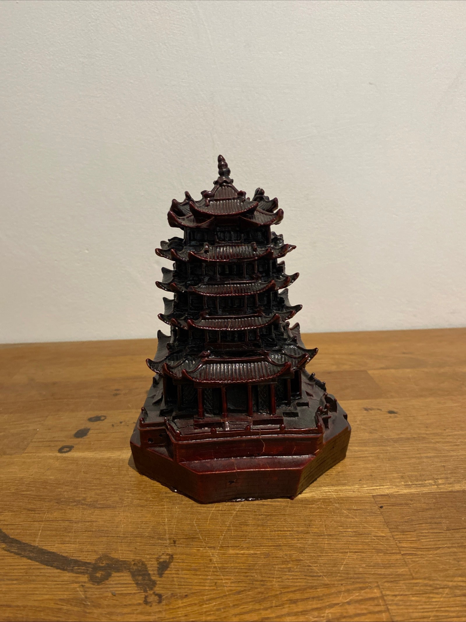 Small Resin Chinese Temple Ornament, Ox Blood Colour .