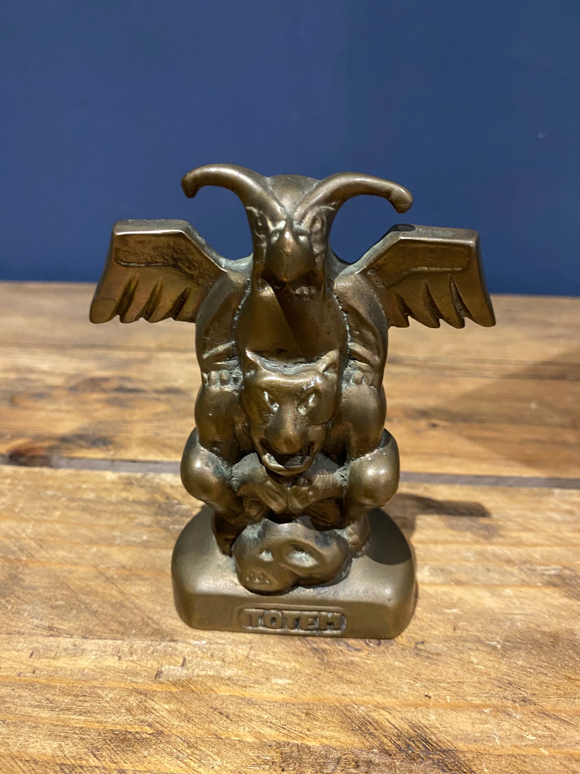 Heavy brass totem ornament
