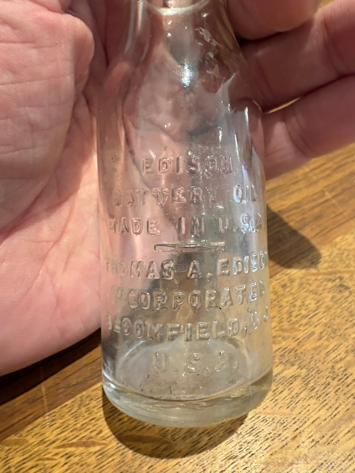 Vintage Edison Battery Oil Glass Bottle , Made In USA. 4 Inches High