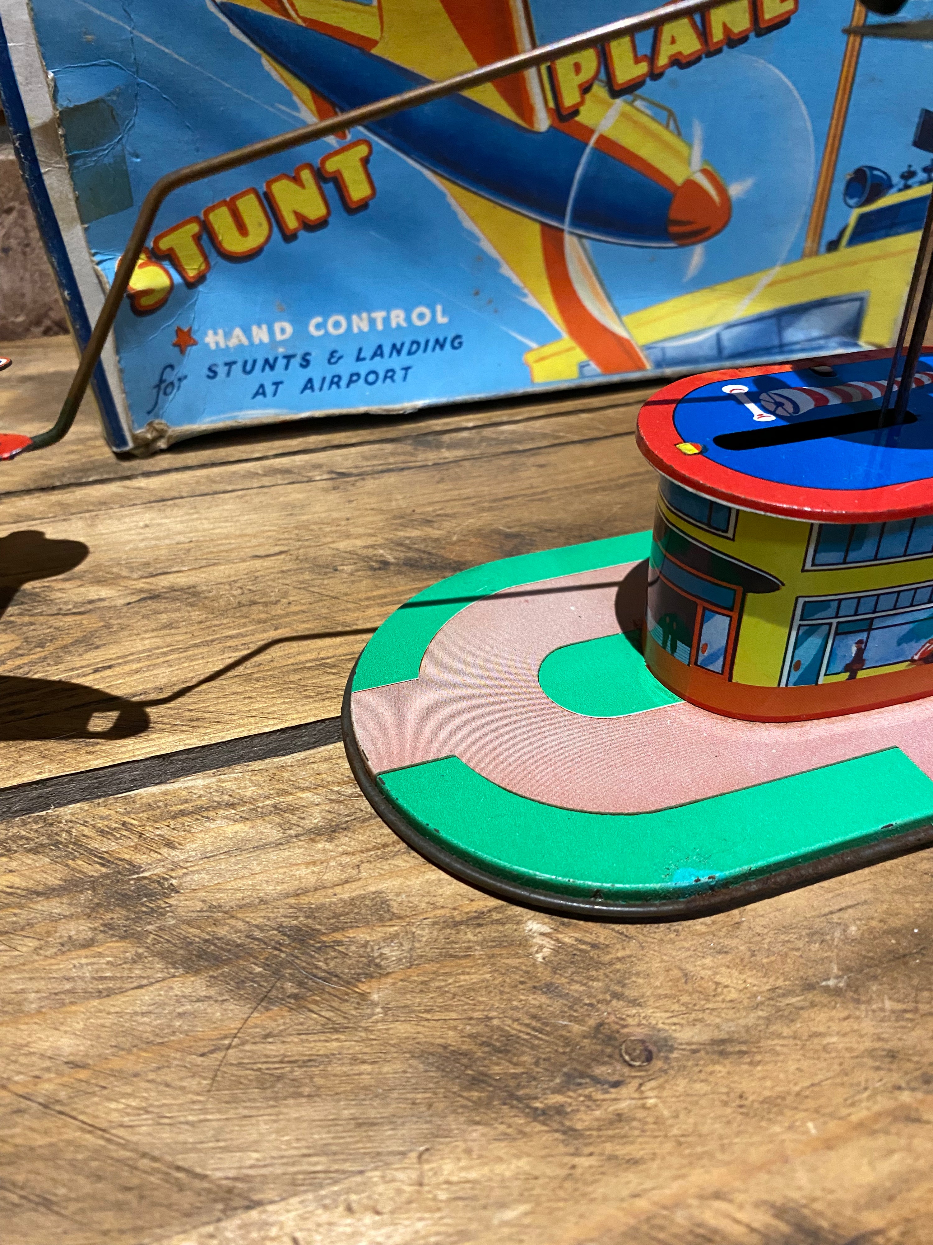 Radar Toys Wind-Up Tin-Plate Stunt Plane