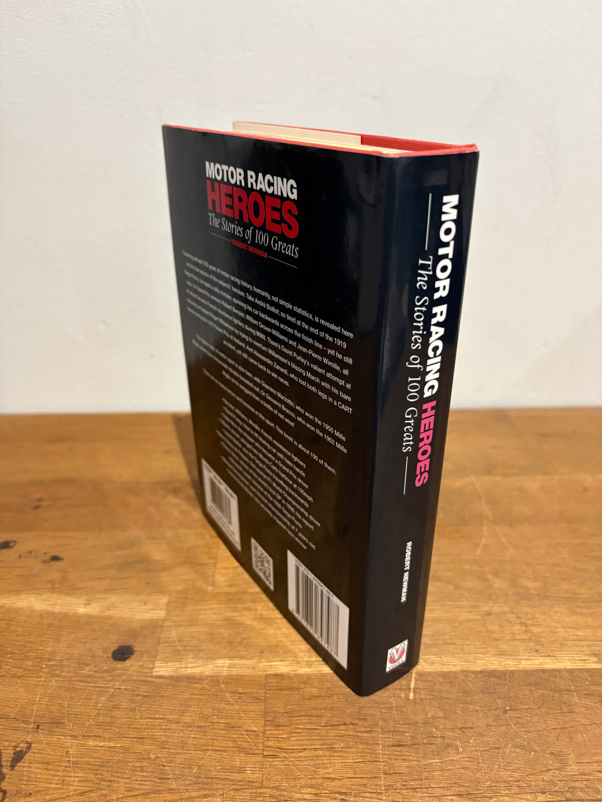 Motor racing heroes, the stories of 100 greats , Robert Newman , hardback