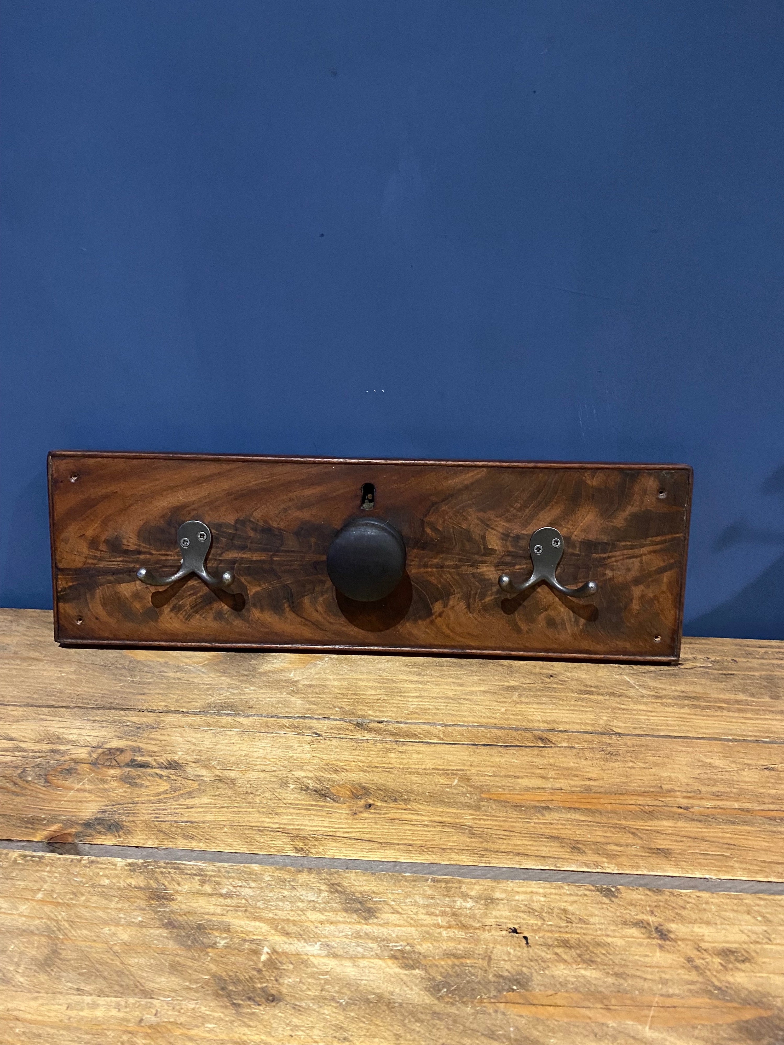 Handmade drawer front coat hanger