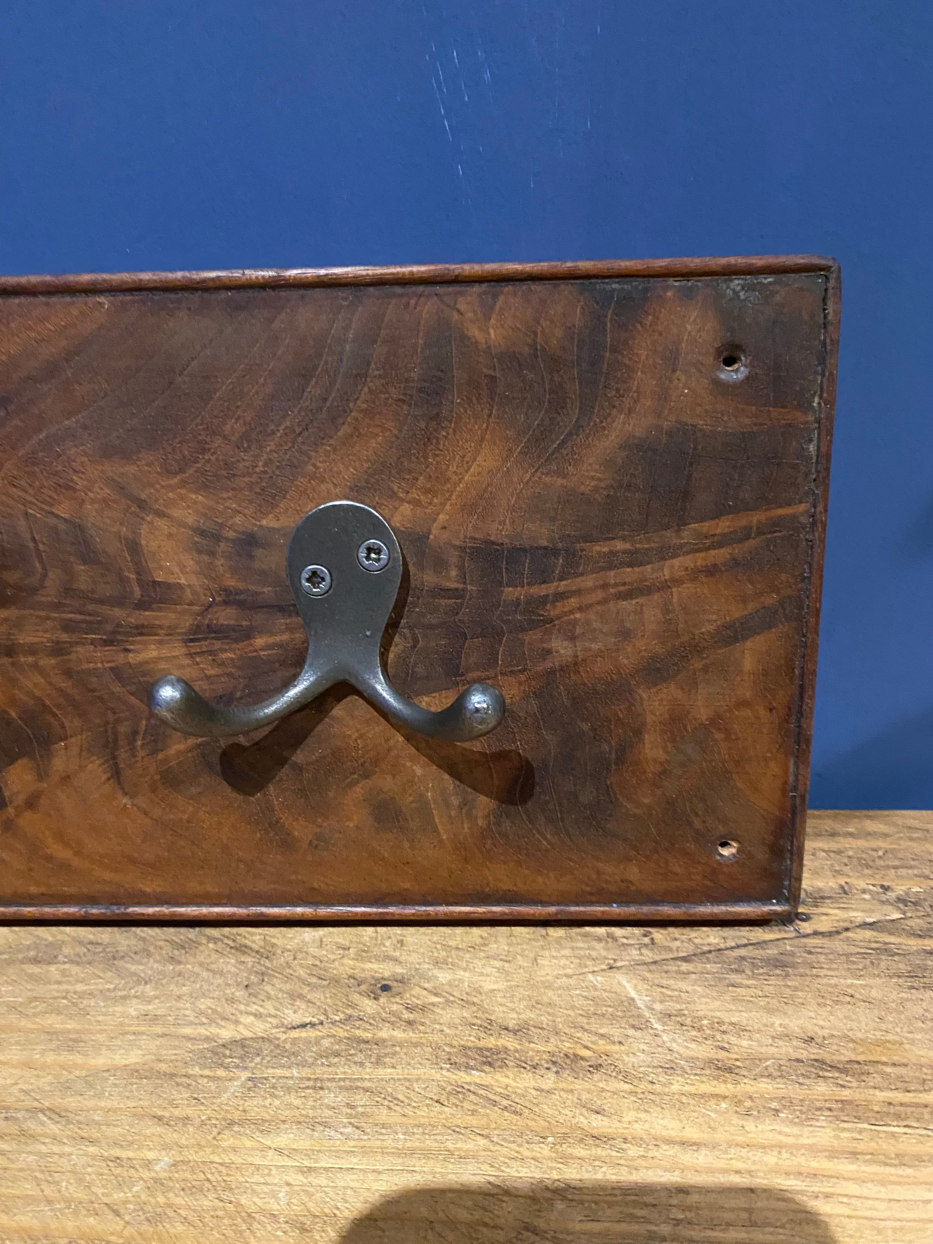 Handmade drawer front coat hanger