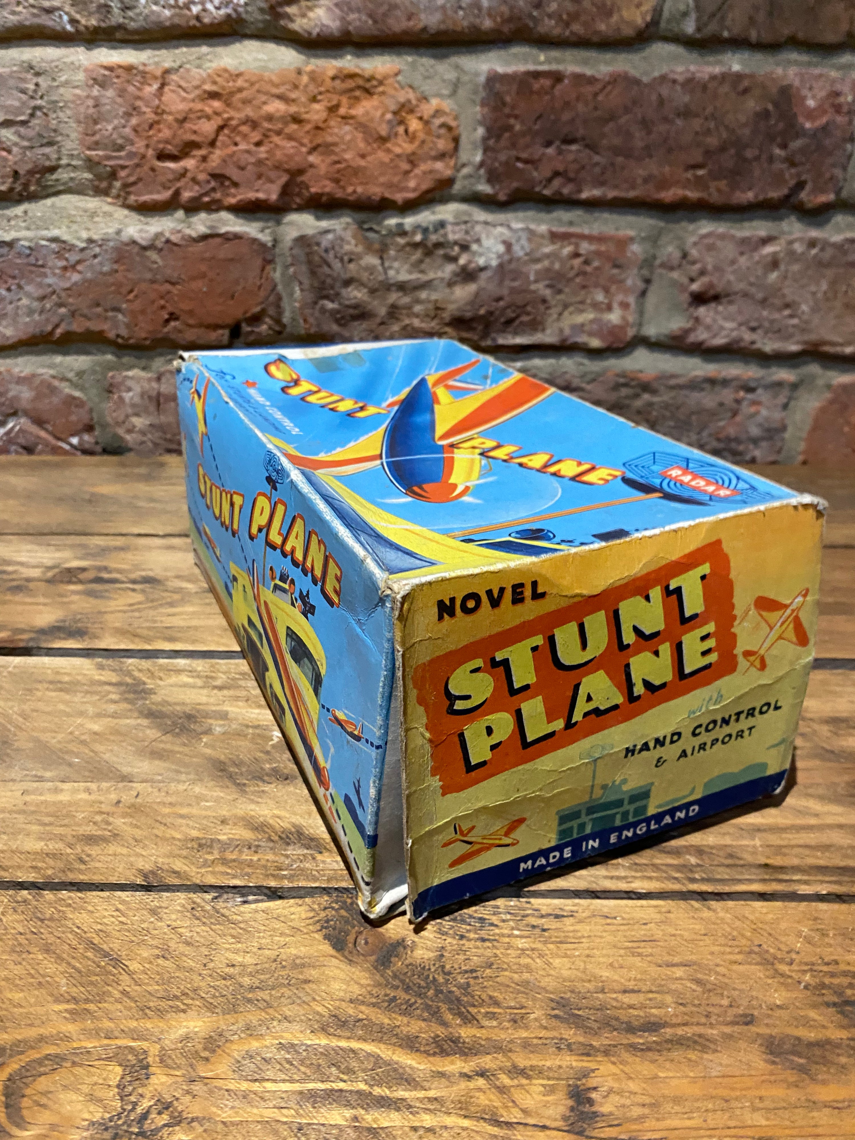 Radar Toys Wind-Up Tin-Plate Stunt Plane
