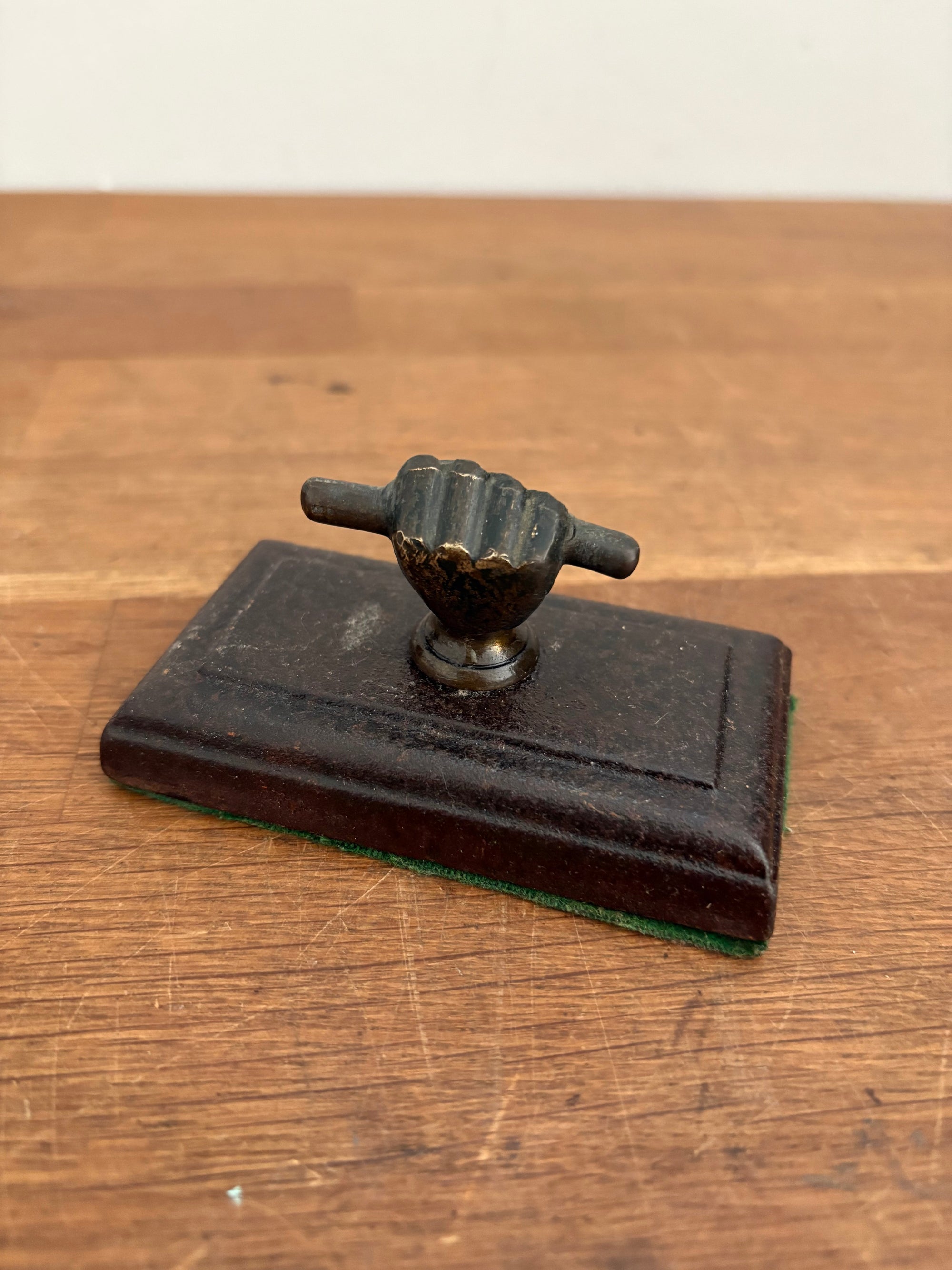 Antique Cast Iron Paperweight, Fist And Scroll/ Hand And Scroll . Brass Hand