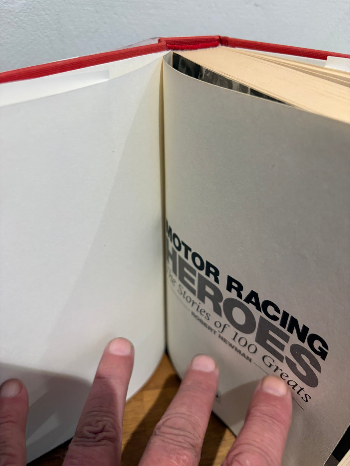 Motor racing heroes, the stories of 100 greats , Robert Newman , hardback