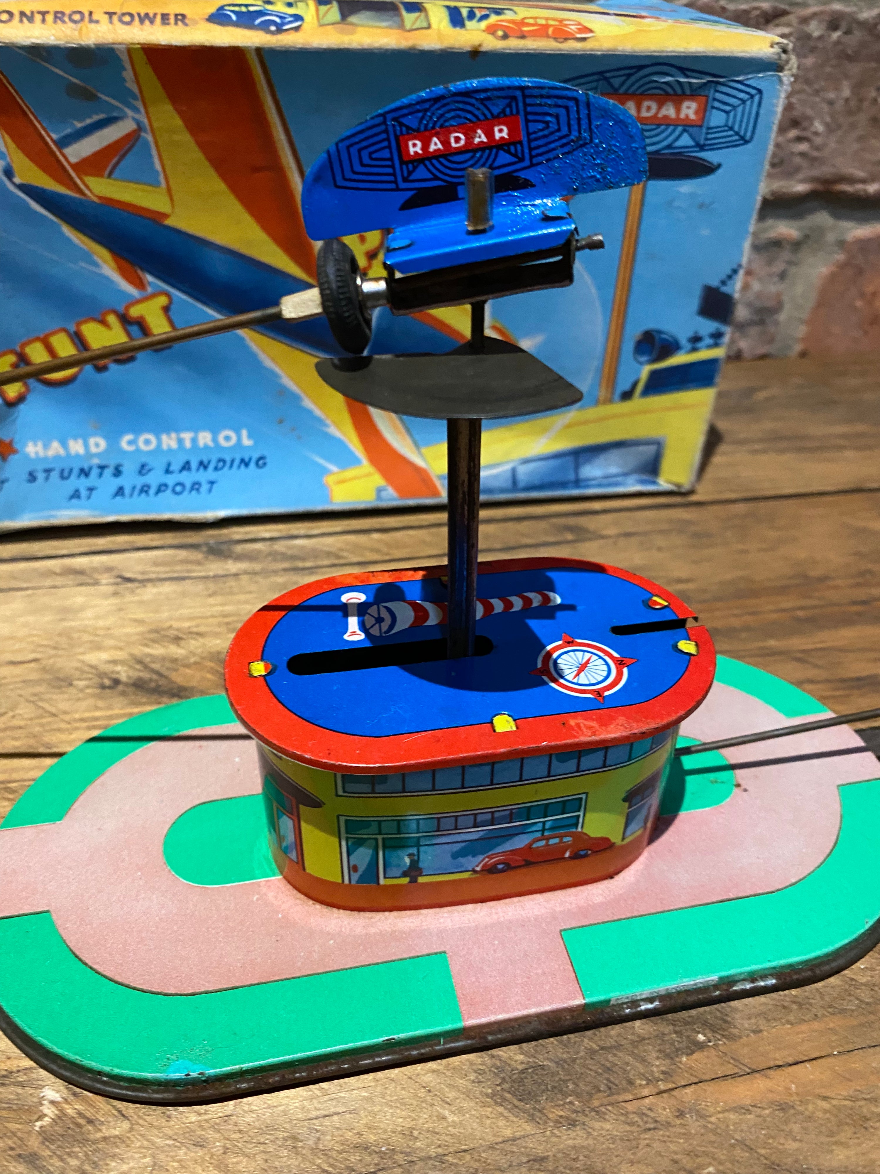Radar Toys Wind-Up Tin-Plate Stunt Plane