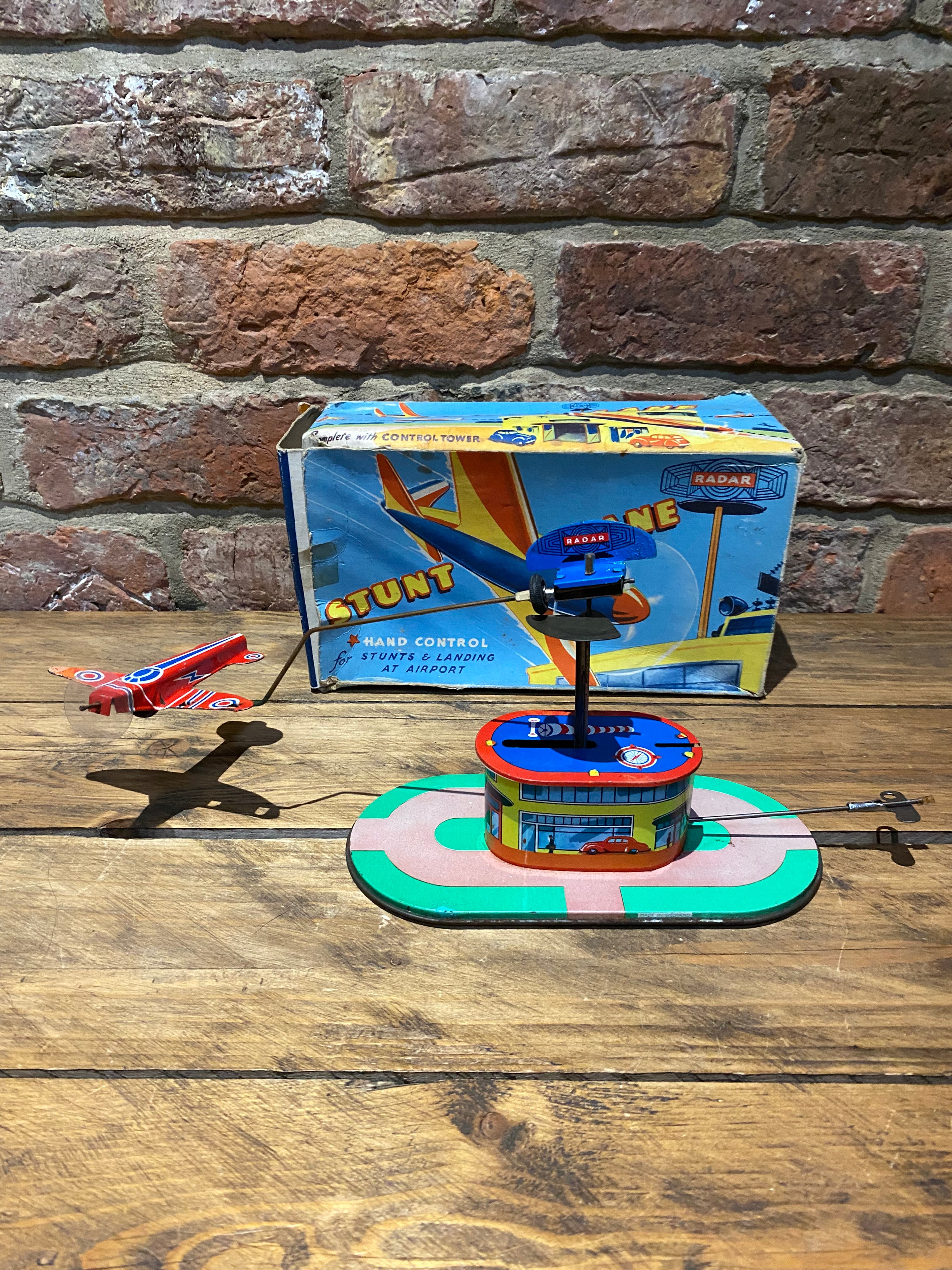 Radar Toys Wind-Up Tin-Plate Stunt Plane | Wilson Fox Antiques