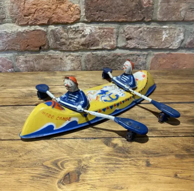 Enjoy playing with this Rare Push Along Mobo Tinplate Canoe | Buy vintage and antiques from Wilson Fox Antiques online shop