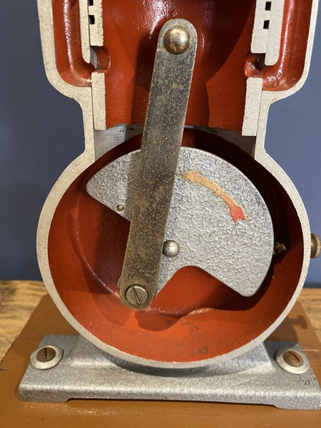 Vintage Cutaway Piston Engine Mounted On A Wooden Base