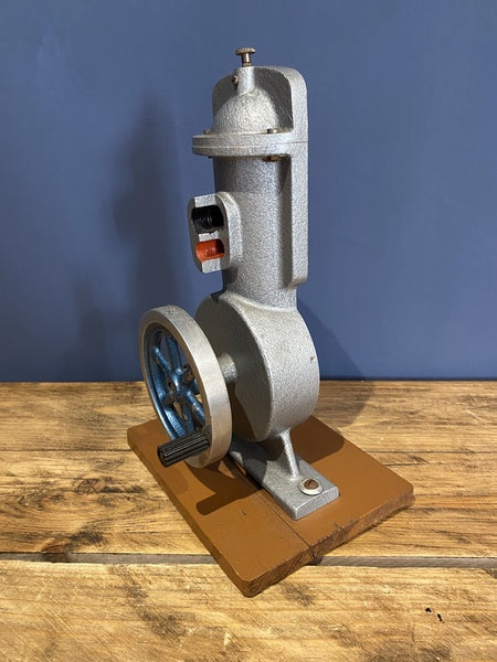 Vintage Cutaway Piston Engine Mounted On A Wooden Base