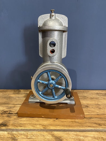 Vintage Cutaway Piston Engine Mounted On A Wooden Base